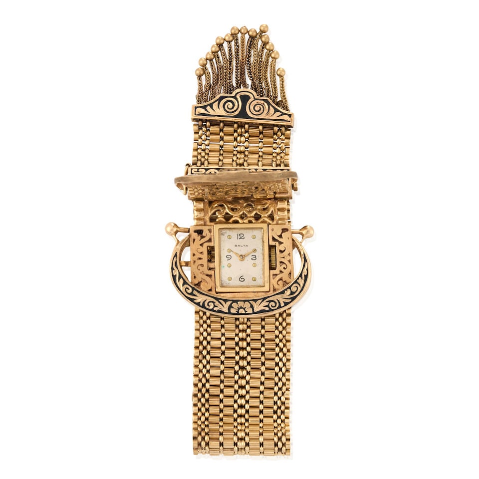 A GOLD COVERED WRISTWATCH, CIRCA 1950 - 2
