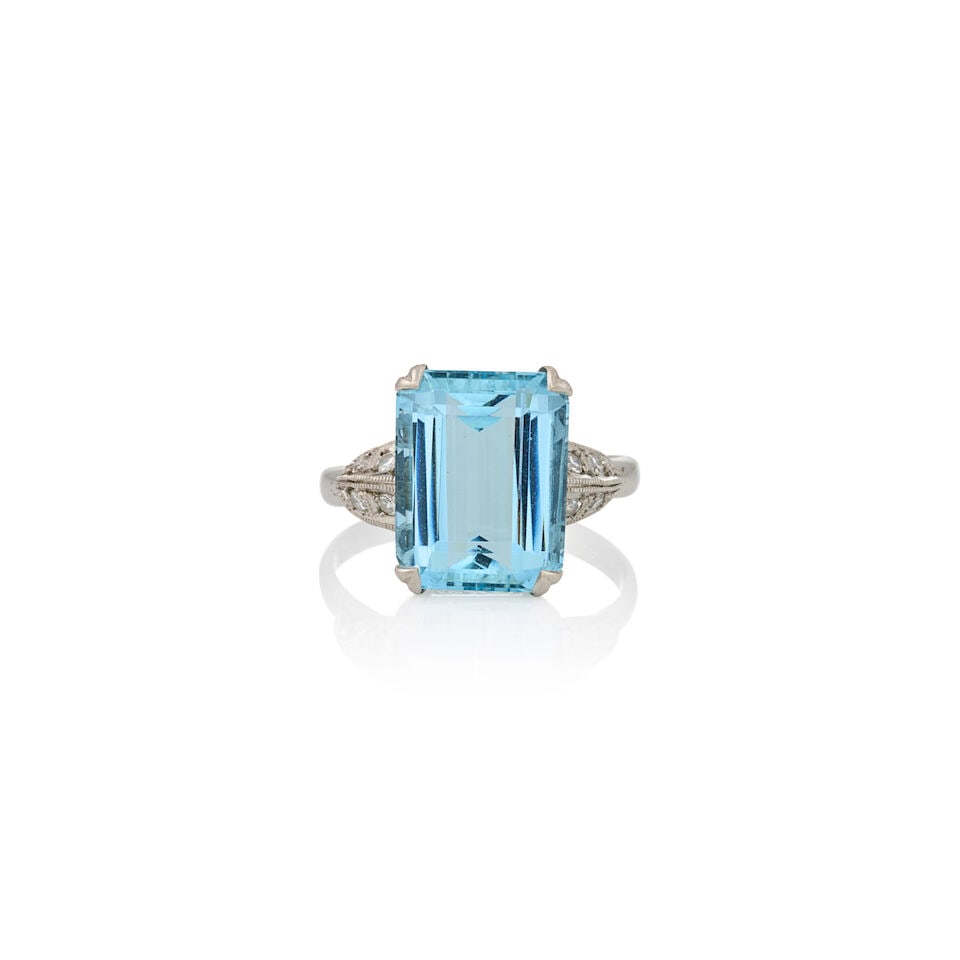 A PLATINUM, AQUAMARINE, AND DIAMOND RING, CIRCA 1950s: A PLATINUM, AQUAMARINE, AND DIAMOND RING, CIRCA 1950s Centering an emerald-cut aquamarine measuring approximately 12.65 x 9.90 x 5.90 mm, with single-cut diamond accents, weight 2.8 dwt, size 6 1/4. F
