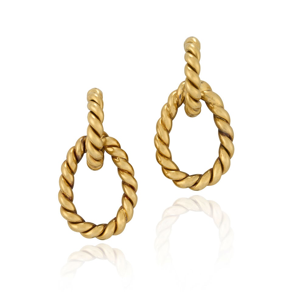 TIFFANY & CO.: A PAIR OF 18K GOLD DAY/NIGHT EARRINGS, CIRCA 1970s: TIFFANY & CO.: A PAIR OF 18K GOLD DAY/NIGHT EARRINGS, CIRCA 1970s Designed as ropetwist hoops with removeable hoop drops, weight 19.1 dwt, signed Tiffany & Co., length with drop 1 7/8, length without