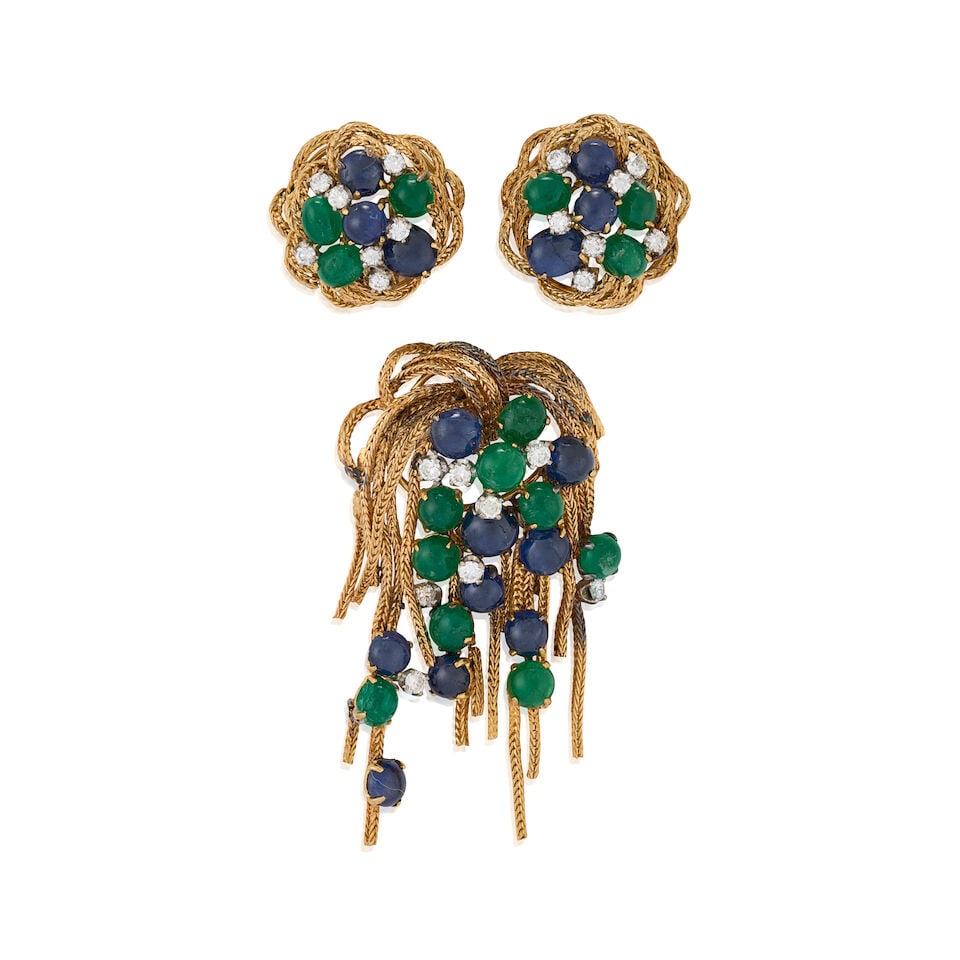 TRIO: AN 18K GOLD, SAPPHIRE, EMERALD, AND DIAMOND SUITE, CIRCA 1960: TRIO: AN 18K GOLD, SAPPHIRE, EMERALD, AND DIAMOND SUITE, CIRCA 1960 Comprising a brooch and pair of earclips, the brooch with cascading fringe set with sapphire and emerald cabochons, and full-cut