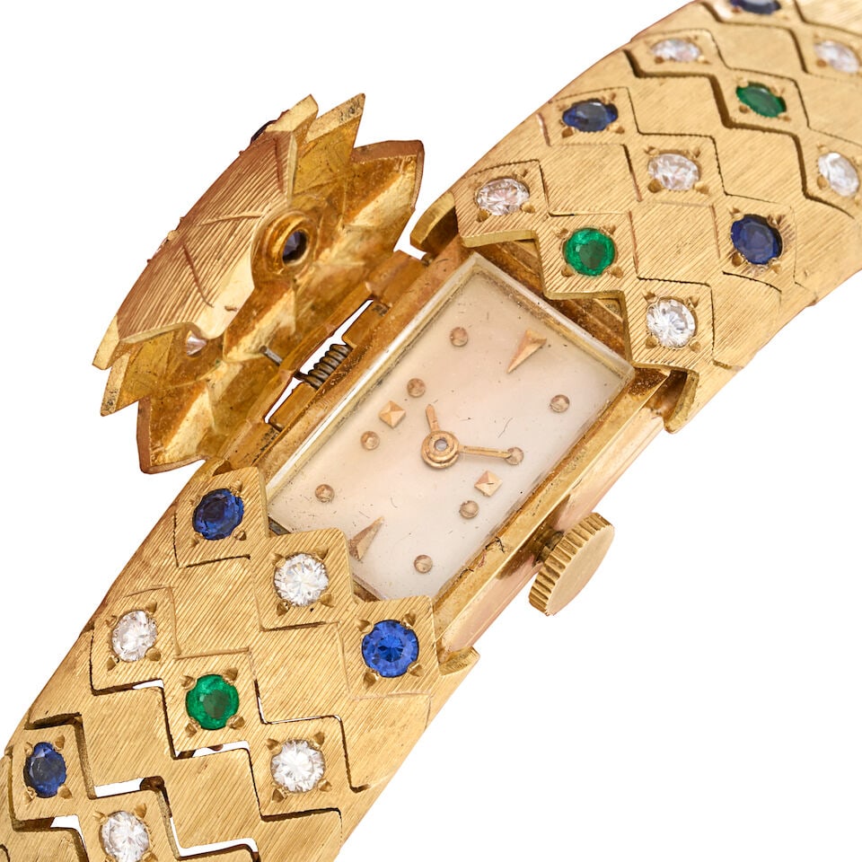 AN 18K GOLD, SAPPHIRE, EMERALD, AND DIAMOND COVERED WRISTWATCH - 3