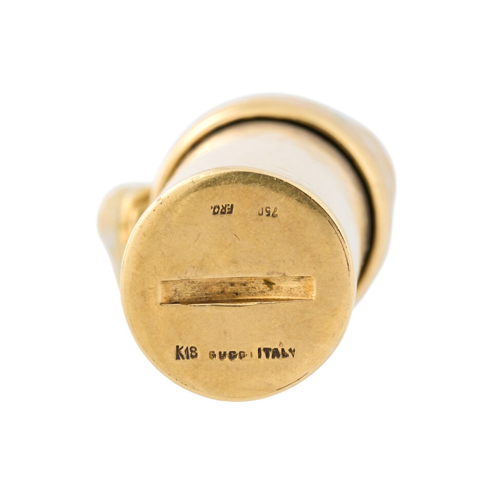 GUCCI: AN 18K GOLD AND ENAMEL PERFUME FLACON, ITALY, CIRCA 1980 - 2