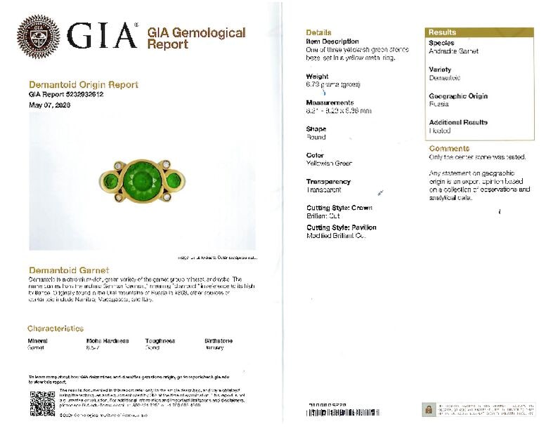 A DEMANTOID GARNET RING - 6
