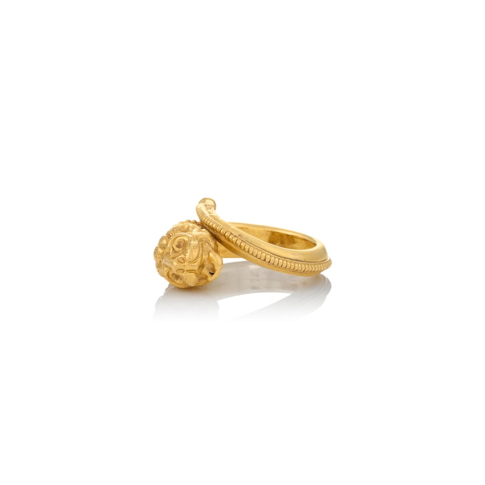 ZOLOTAS: A 22K GOLD LION RING - 5