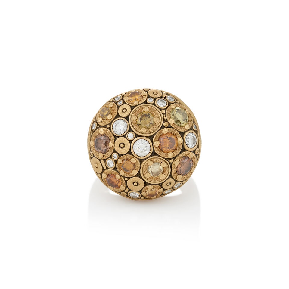 AN 18K GOLD, FANCY COLORED DIAMOND, AND DIAMOND RING: AN 18K GOLD, FANCY COLORED DIAMOND, AND DIAMOND RING Set with fancy colored full-cut diamonds, and bezel-set near colorless diamonds, approximate total weight 2.00 carats, weight 13.3 dwt, between siz