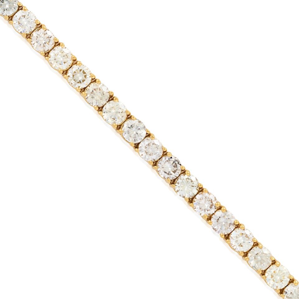 A 14K GOLD AND DIAMOND BRACELET - 3