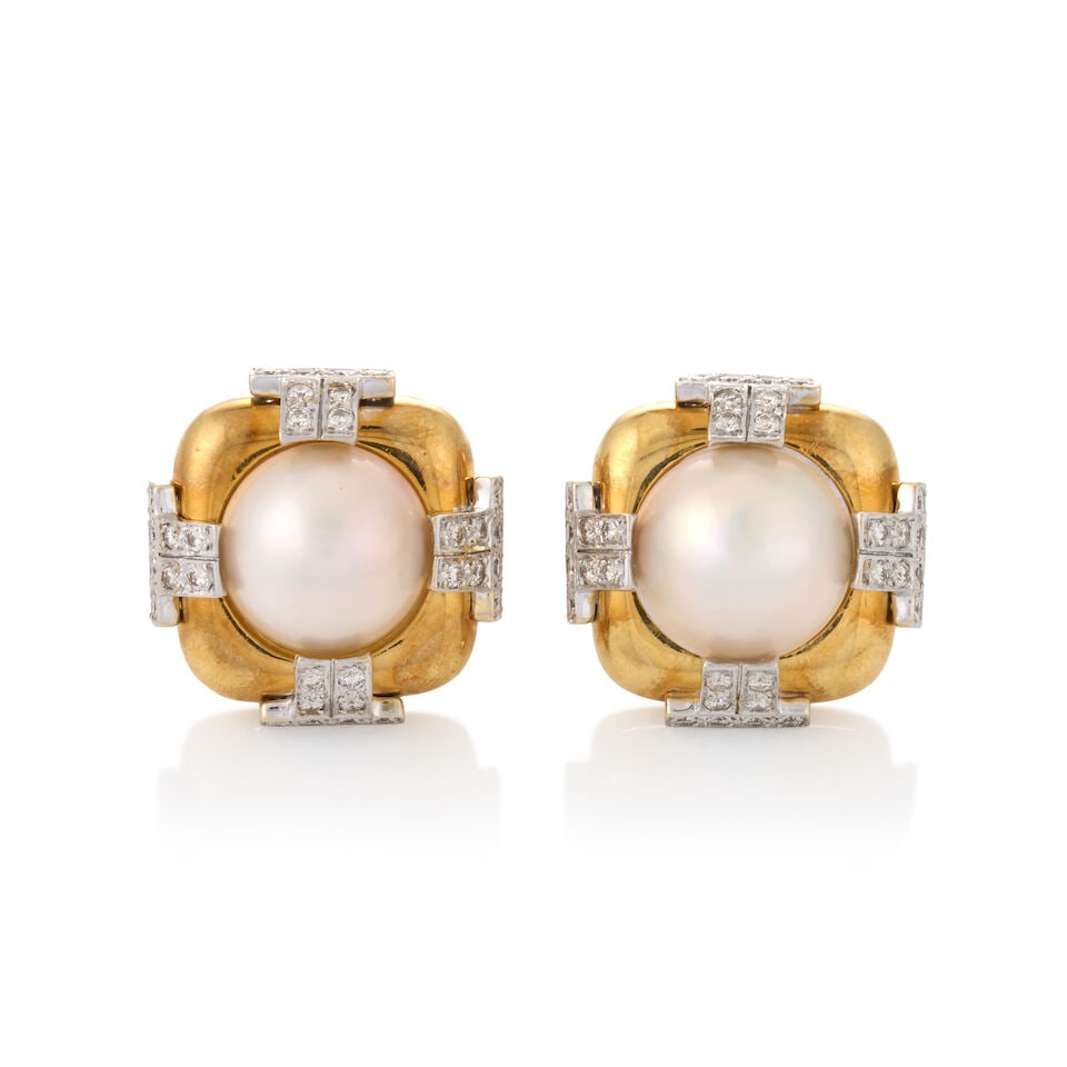 A PAIR OF BI-COLOR GOLD, MABÉ PEARL, AND DIAMOND EARRINGS: A PAIR OF BI-COLOR GOLD, MABÉ PEARL, AND DIAMOND EARRINGS Centering mabé pearls measuring approximately 15.50 and 16.20 mm, with full-cut diamond stations, approximate total diamond weight 1