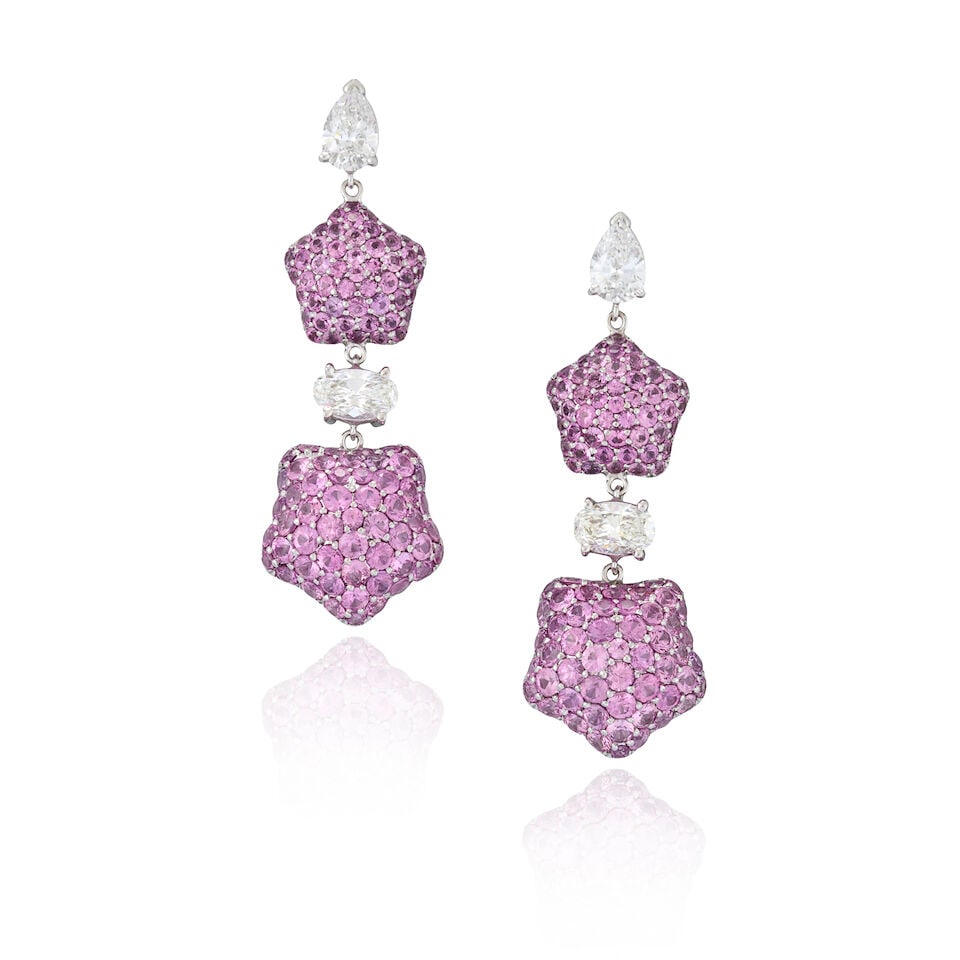 A PAIR OF WHITE GOLD, PINK SAPPHIRE, AND DIAMOND EARRINGS: A PAIR OF WHITE GOLD, PINK SAPPHIRE, AND DIAMOND EARRINGS Designed as pave-set pink sapphire stars, suspended from pear and oval-shape diamonds, total diamond weight 2.16 carats, weight 8.6 dwt,