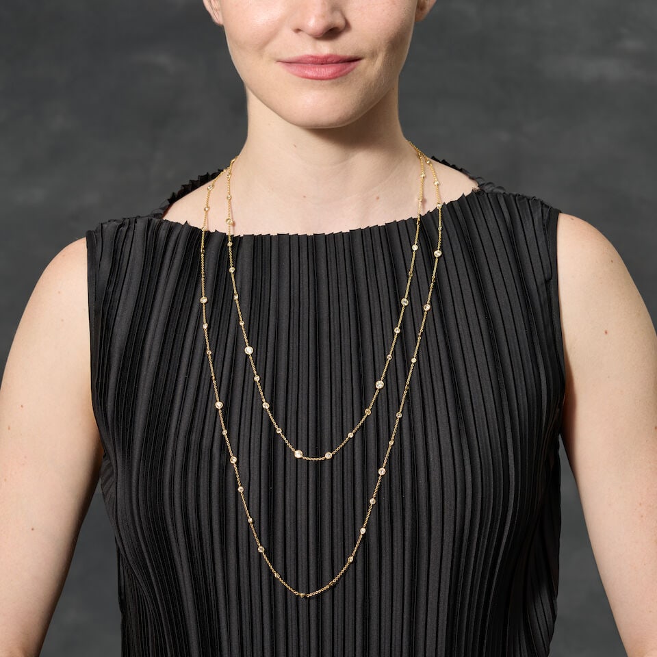 A 14K GOLD AND DIAMOND NECKLACE - 2