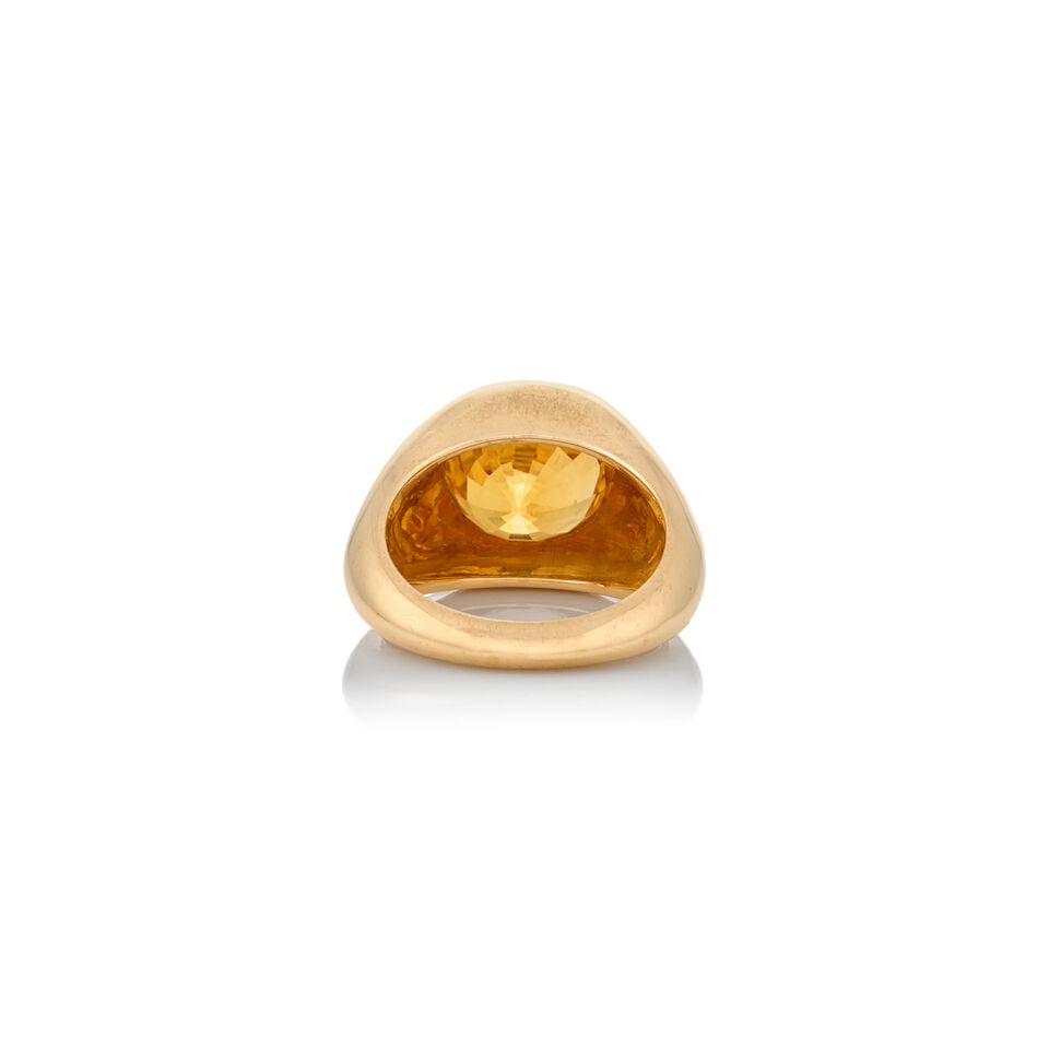 AN 18K GOLD AND ORANGE SAPPHIRE RING - 3