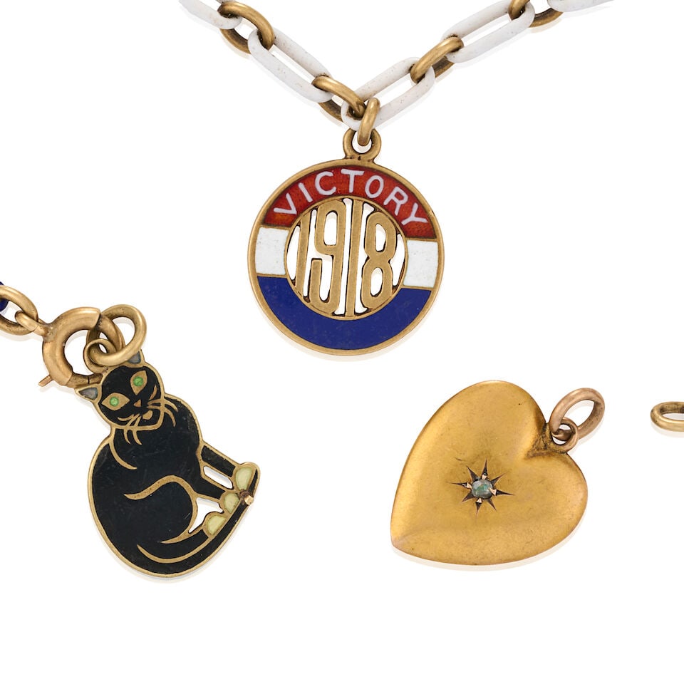 AN ANTIQUE 14K GOLD AND ENAMEL CHARM BRACELET - 3
