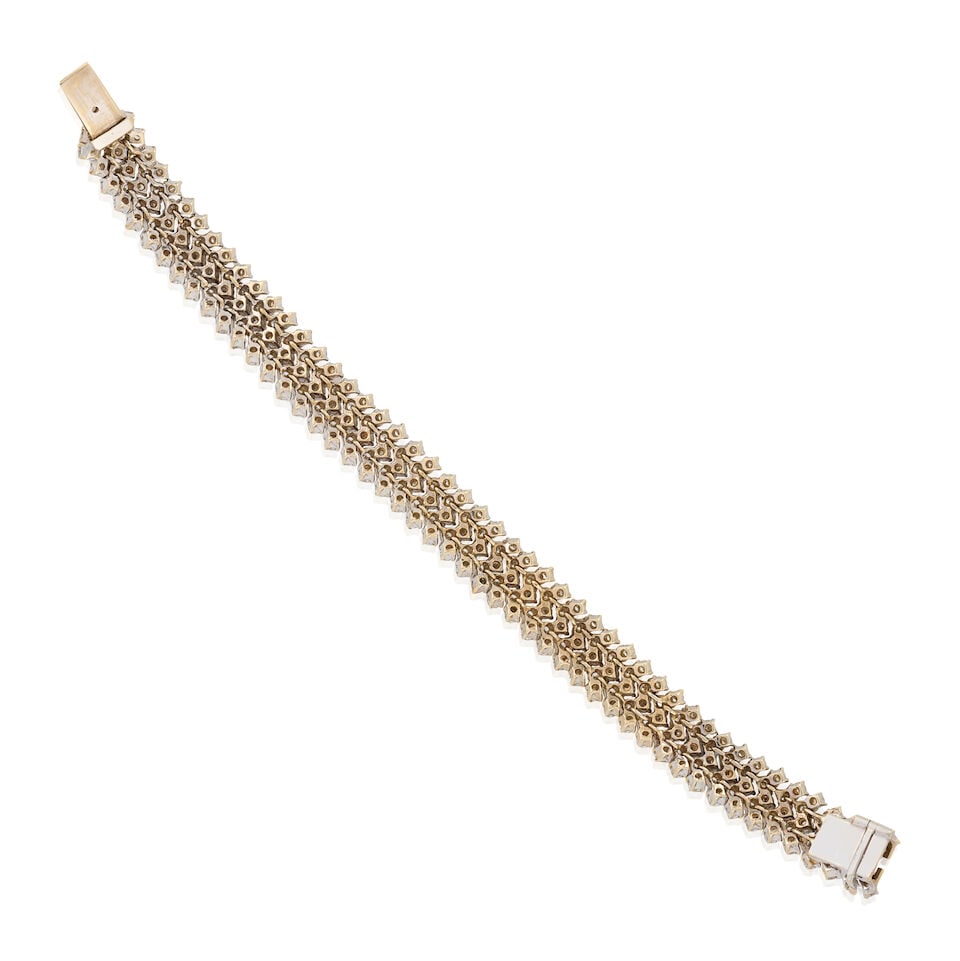 A GOLD AND DIAMOND BRACELET - 3