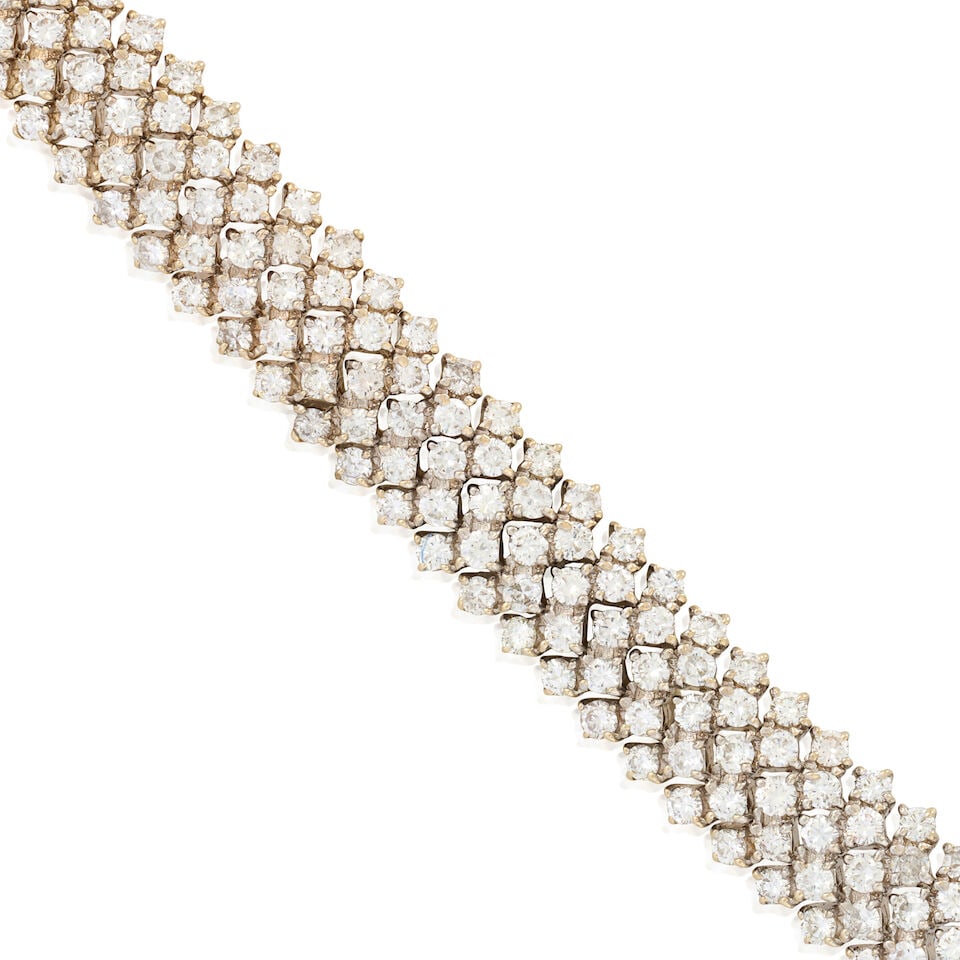 A GOLD AND DIAMOND BRACELET - 4