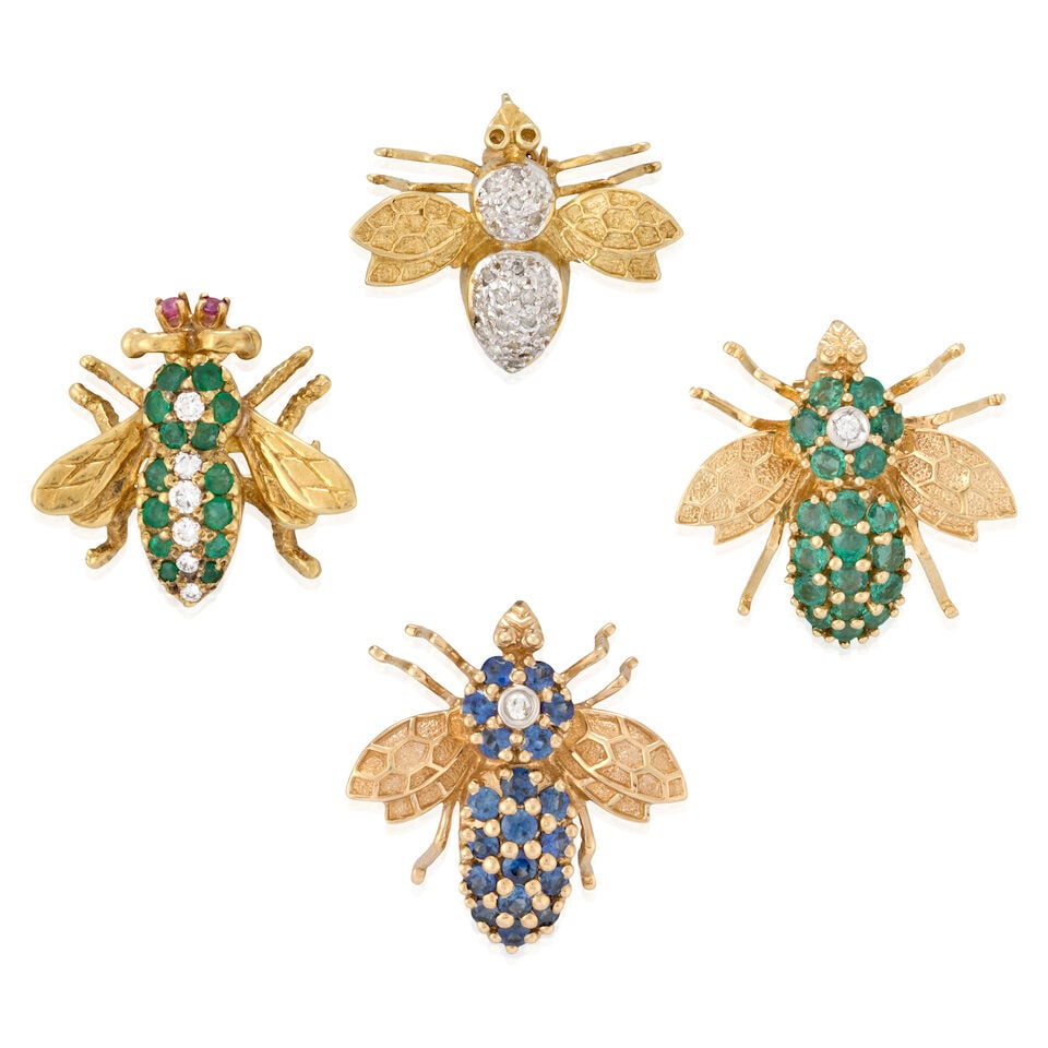 A GROUP OF FOUR GOLD, GEM-SET, AND DIAMOND BEE PENDANT/BROOCHES: A GROUP OF FOUR GOLD, GEM-SET, AND DIAMOND BEE PENDANT/BROOCHES Comprising one 18k gold set with circular-cut emeralds and full-cut diamonds, with circular-cut ruby eyes, and three 14k gold including 
