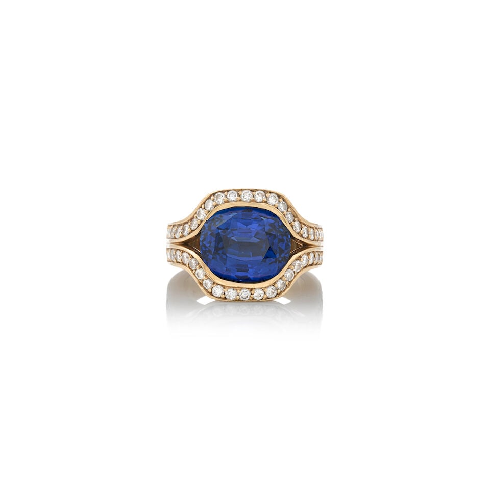 A 14K GOLD, SAPPHIRE, AND DIAMOND RING: A 14K GOLD, SAPPHIRE, AND DIAMOND RING Centering a cushion-cut sapphire measuring approximately 11.34 x 9.58 x 7.97 mm, framed by full-cut diamonds, weight 6.6 dwt, size 4 1/2. Footnotes: Accompanied