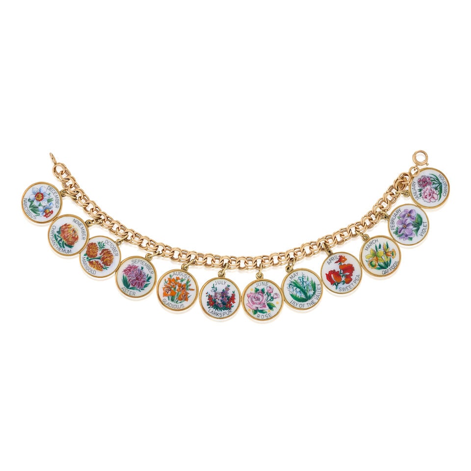 MARCHAL: A 14K GOLD AND ENAMEL CHARM BRACELET, CIRCA 1960s: MARCHAL: A 14K GOLD AND ENAMEL CHARM BRACELET, CIRCA 1960s Suspending twelve enamel discs, each depicting the birth flower for each month of the year, weight 24.2 dwt, maker's marks for Marchal to bra