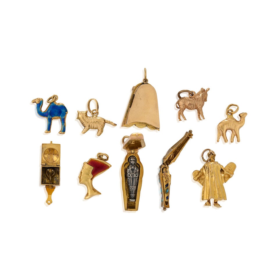 A GROUP OF MOSTLY GOLD CHARMS - 2