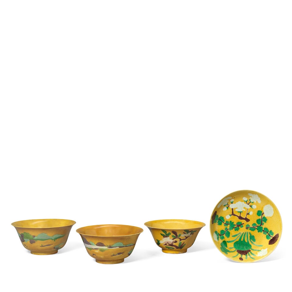A YELLOW, GREEN AND AUBERGINE-GLAZED DISH AND TWO YELLOW GROUND, GREEN AND AUBERGINE-GLAZED VESS... (1 of 3)