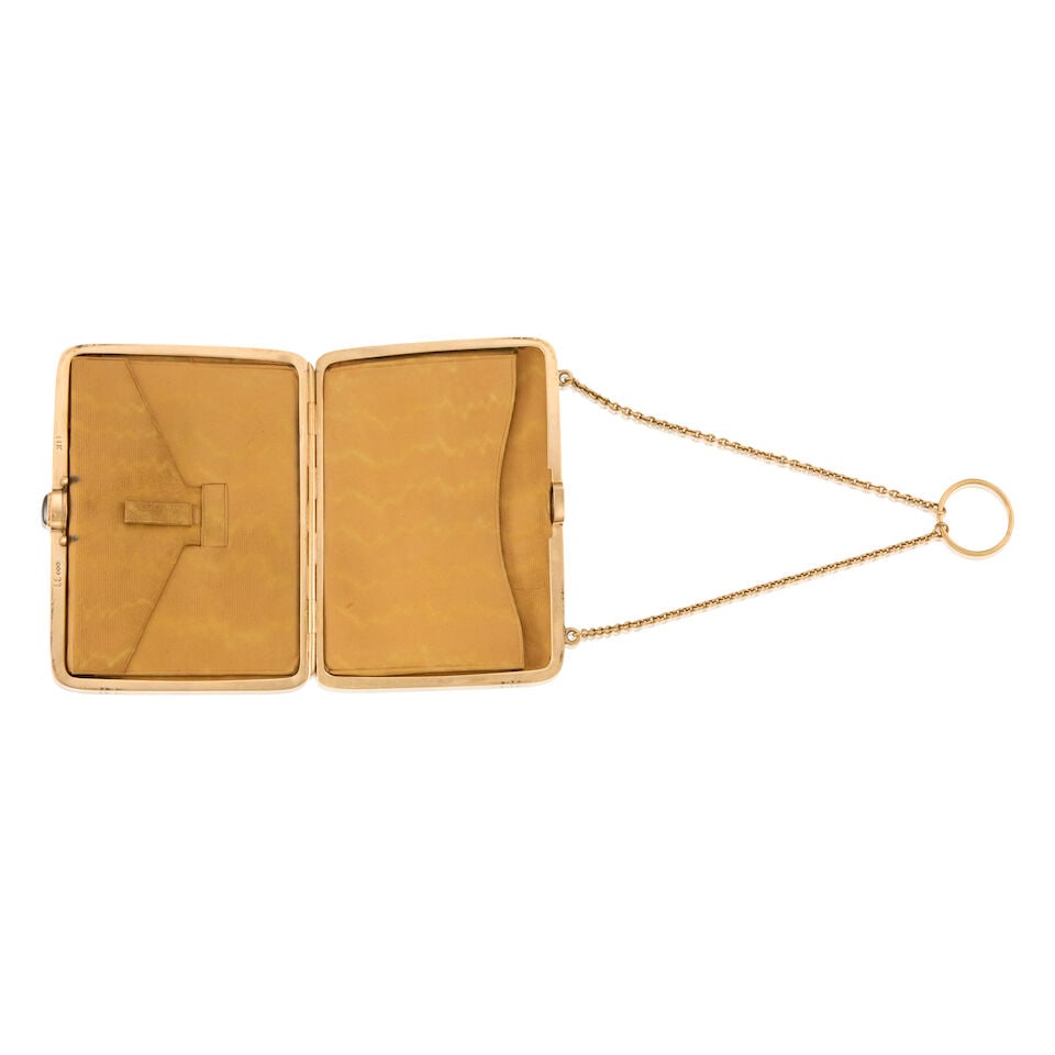 A GOLD WALLET COMPACT - 2