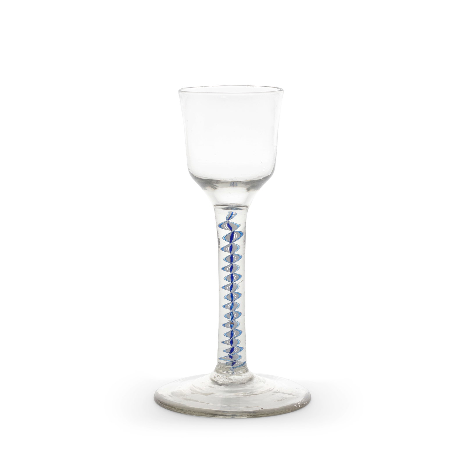 A fine blue colour twist wine glass, circa 1765: A fine blue colour twist wine glass, circa 1765 The ogee bowl set on a stem containing an opaque white multi-ply corkscrew containing a pair of translucent cobalt-blue threads towards the edges, aroun