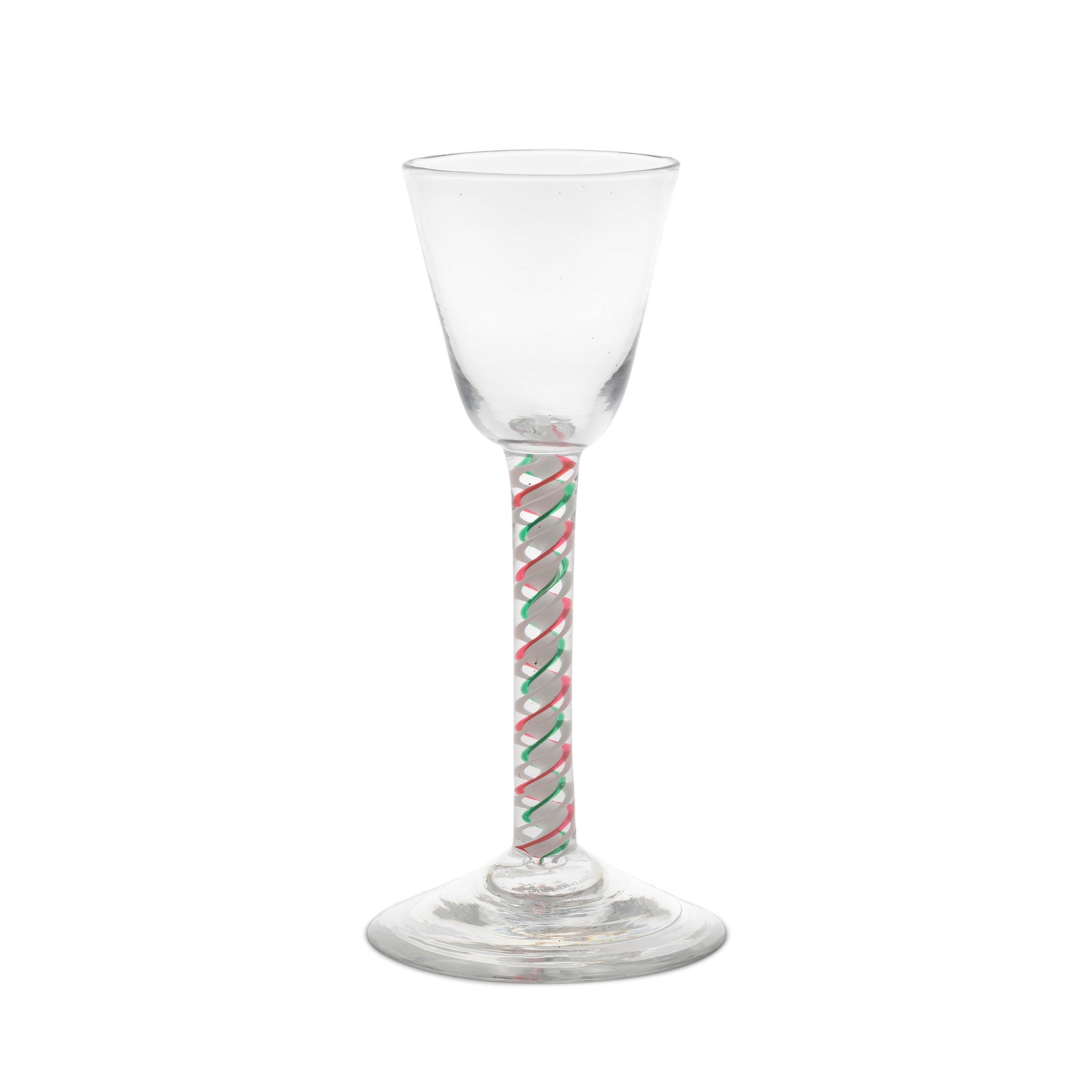 A red and green colour twist wine glass, circa 1765: A red and green colour twist wine glass, circa 1765 The round funnel bowl set on a stem containing a solid opaque white corkscrew edged in translucent emerald-green on one side and translucent ruby-re
