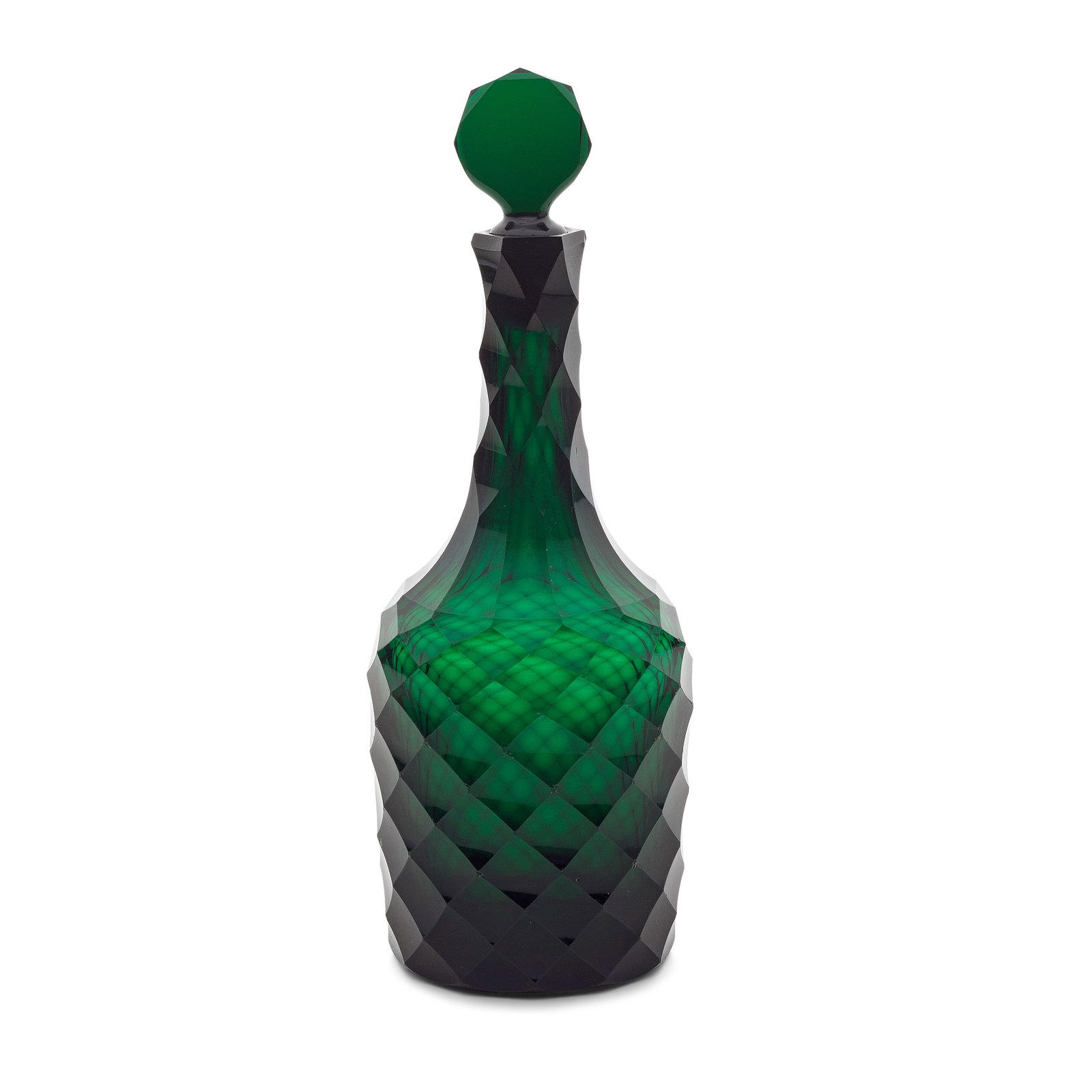 A rare green glass decanter and stopper, circa 1765-70: A rare green glass decanter and stopper, circa 1765-70 In deep emerald-green glass, of shouldered form and cut all over with diamond facets, with extending flutes to the shoulders, with a 'clipped' di