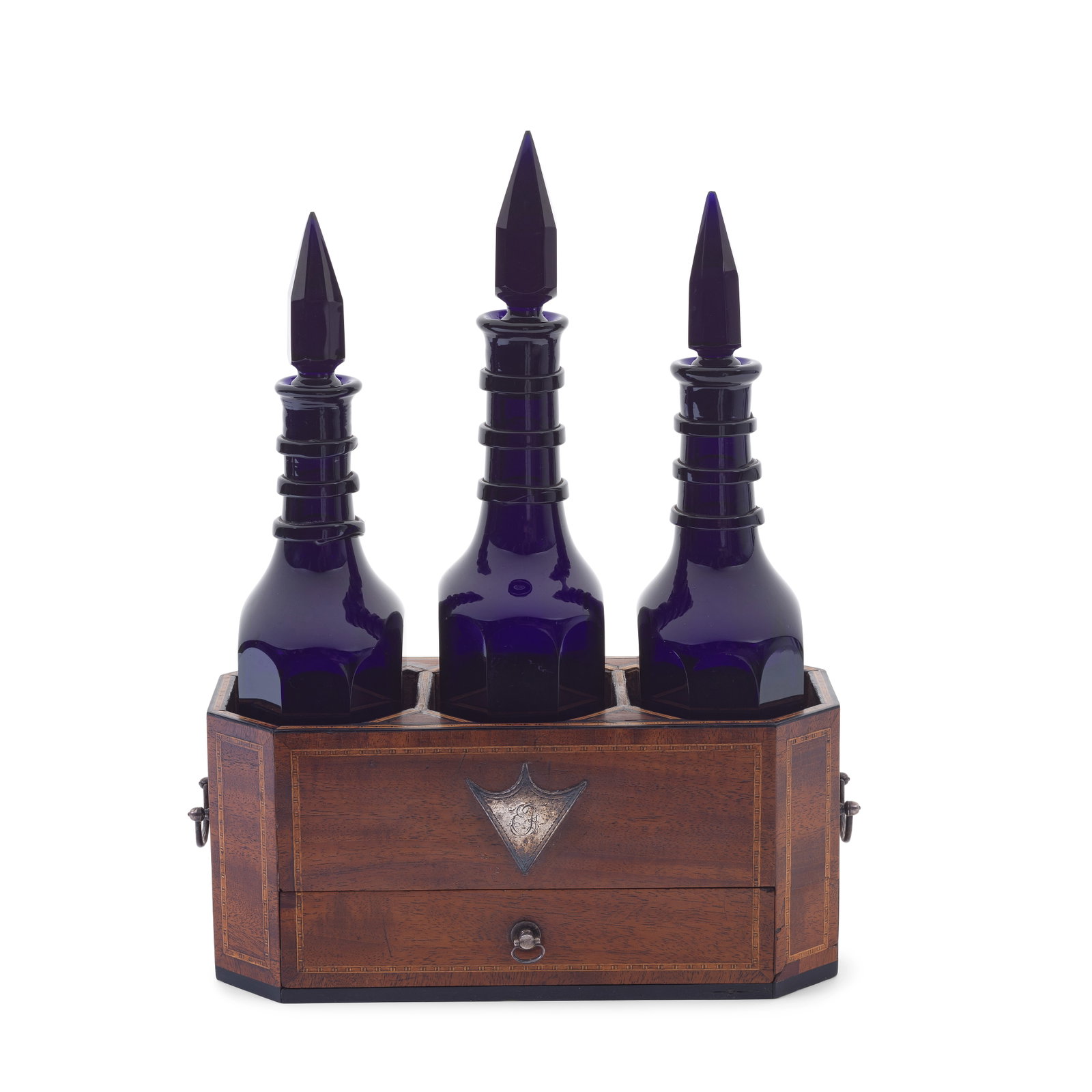 A rare set of three blue glass spirit decanters and stoppers in a wooden stand, circa 1780 (1 of 1)
