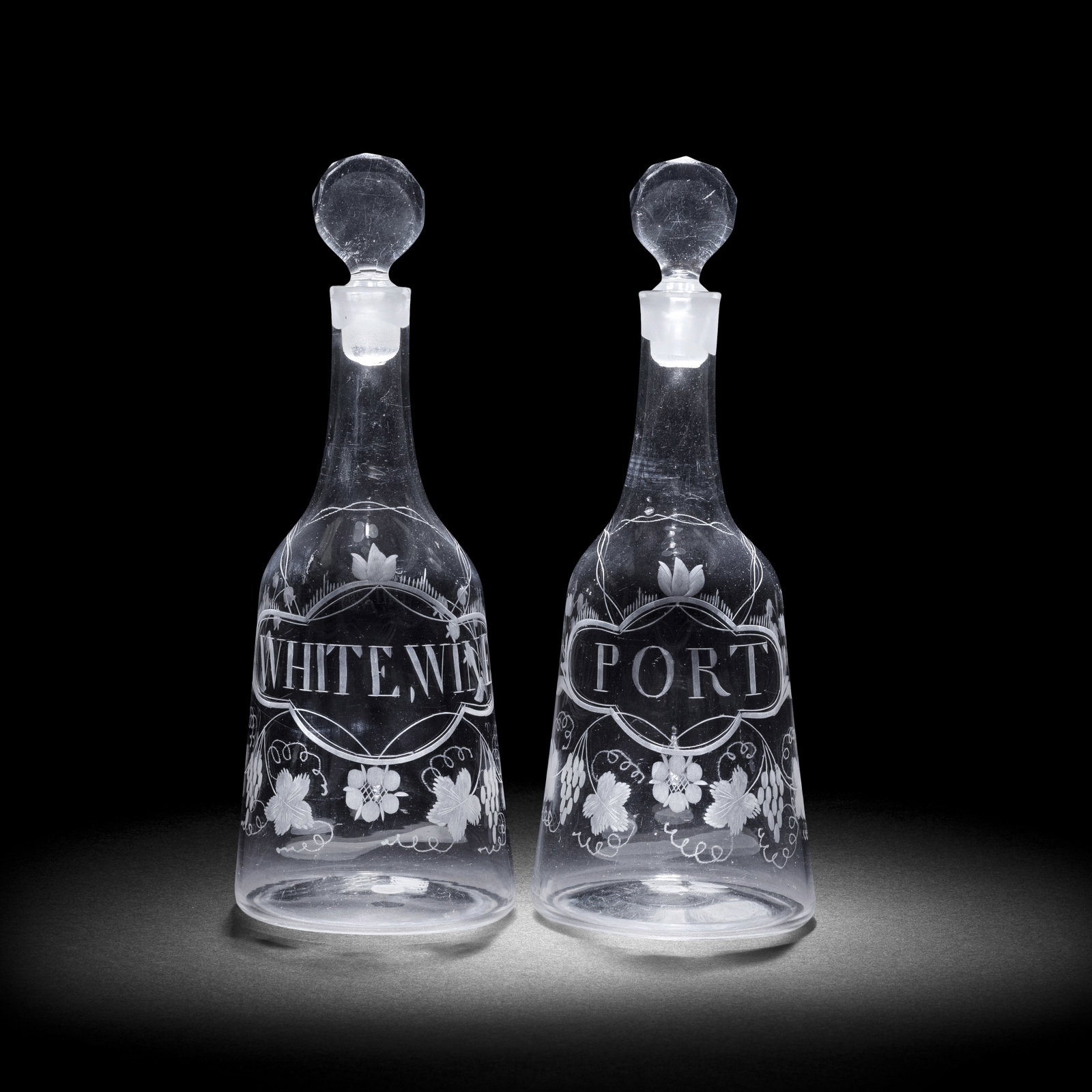 A fine pair of engraved Port and White Wine decanters and stoppers, circa 1770 (1 of 1)