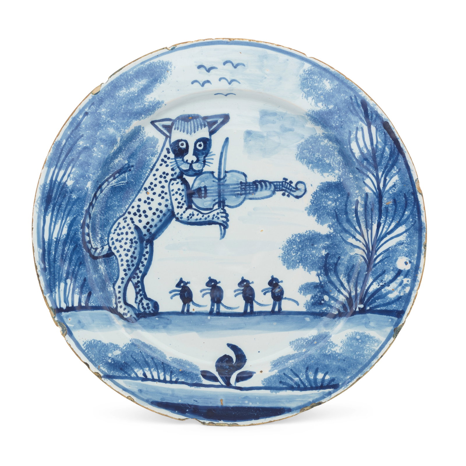An exceptional English delftware large dish, circa 1720-40: An exceptional English delftware large dish, circa 1720-40 Probably Lambeth, London, painted in blue with a spotted cat playing a fiddle as a line of four mice dance to his tune, flanked by sponged tr