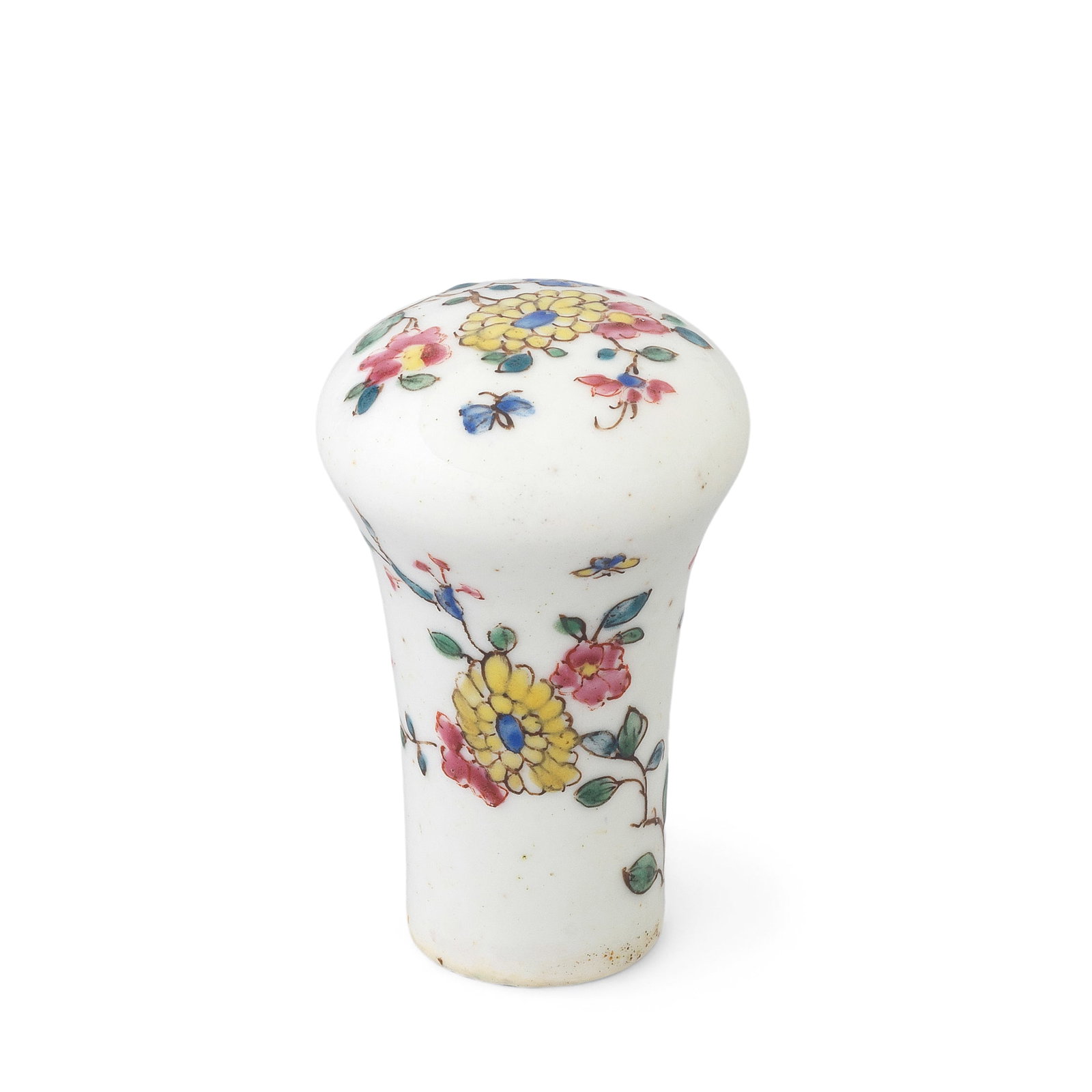 A rare and early Bow cane handle, circa 1747-50: A rare and early Bow cane handle, circa 1747-50 With 'mushroom-glaze', the slender form painted in famille rose style with trailing flower sprays and scattered insects, 5.7cm high Footnotes: Provenanc