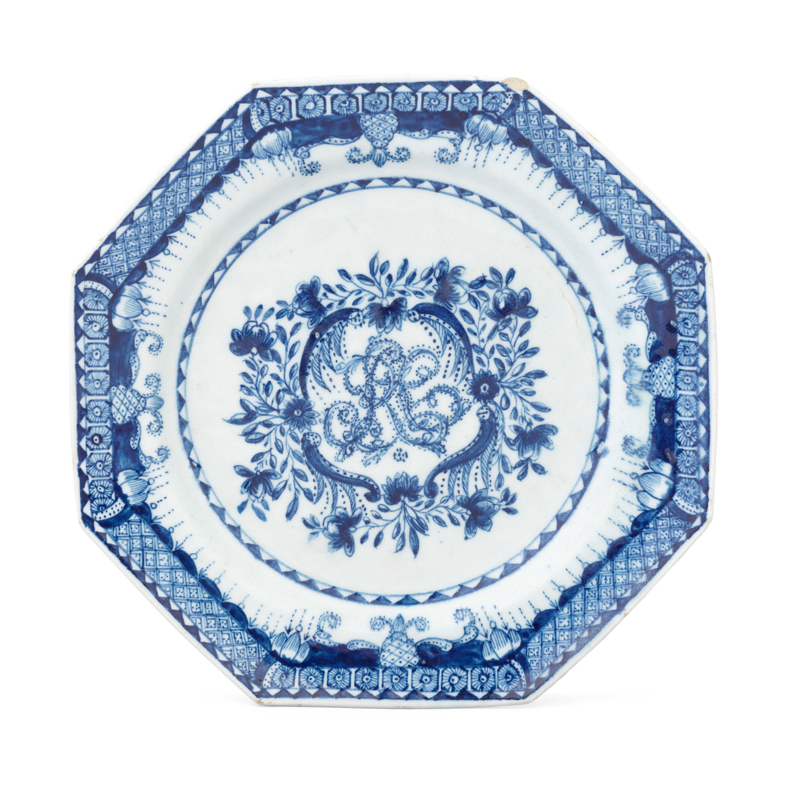 A documentary Bow plate, dated 1770: A documentary Bow plate, dated 1770 Of octagonal shape, painted in blue with the entwined monogram 'RC', within a dense floral cartouche, an elaborate border within the rim, the reverse inscribed 'MR 