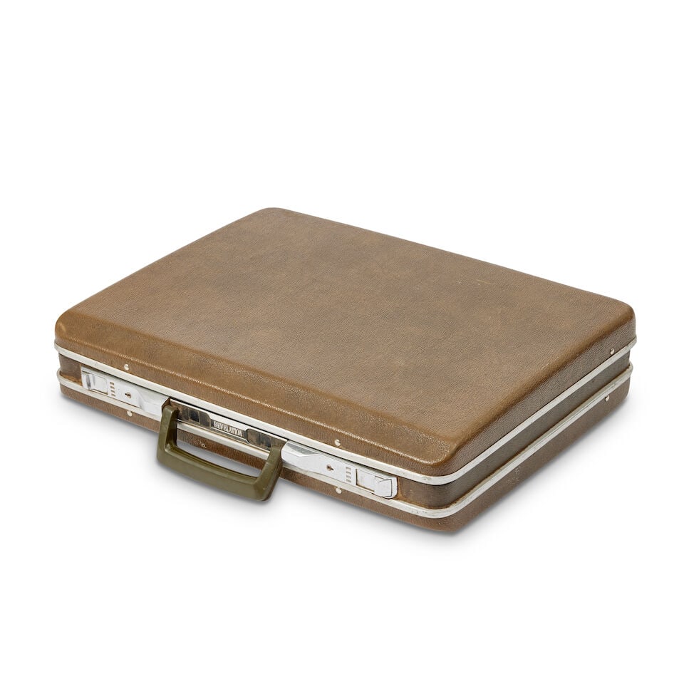 A briefcase prop and related graphics (Qty) - 2