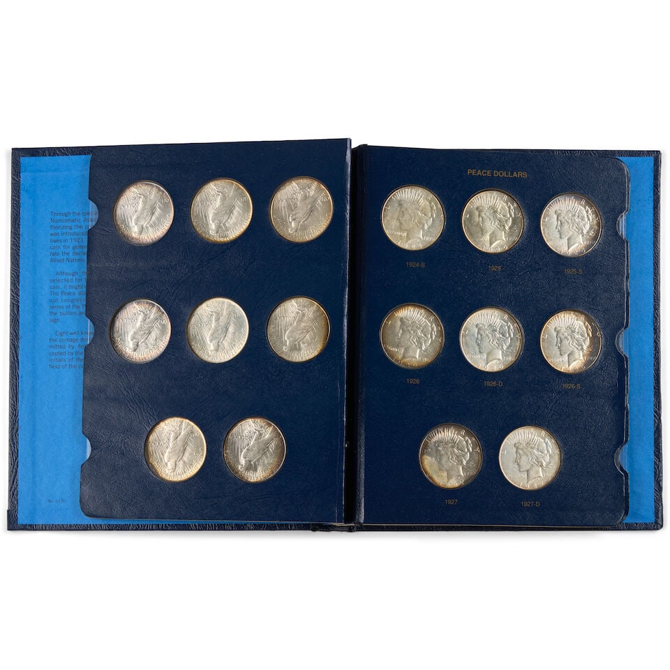 A NEARLY COMPLETE SET OF UNITED STATES PEACE DOLLARS. - 2
