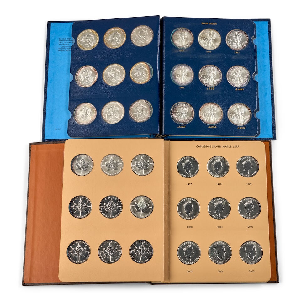 AN ALBUM OF UNITED STATES SILVER EAGLES AND AN ALBUM OF CANADIAN SILVER MAPLE LEAFS. - 2