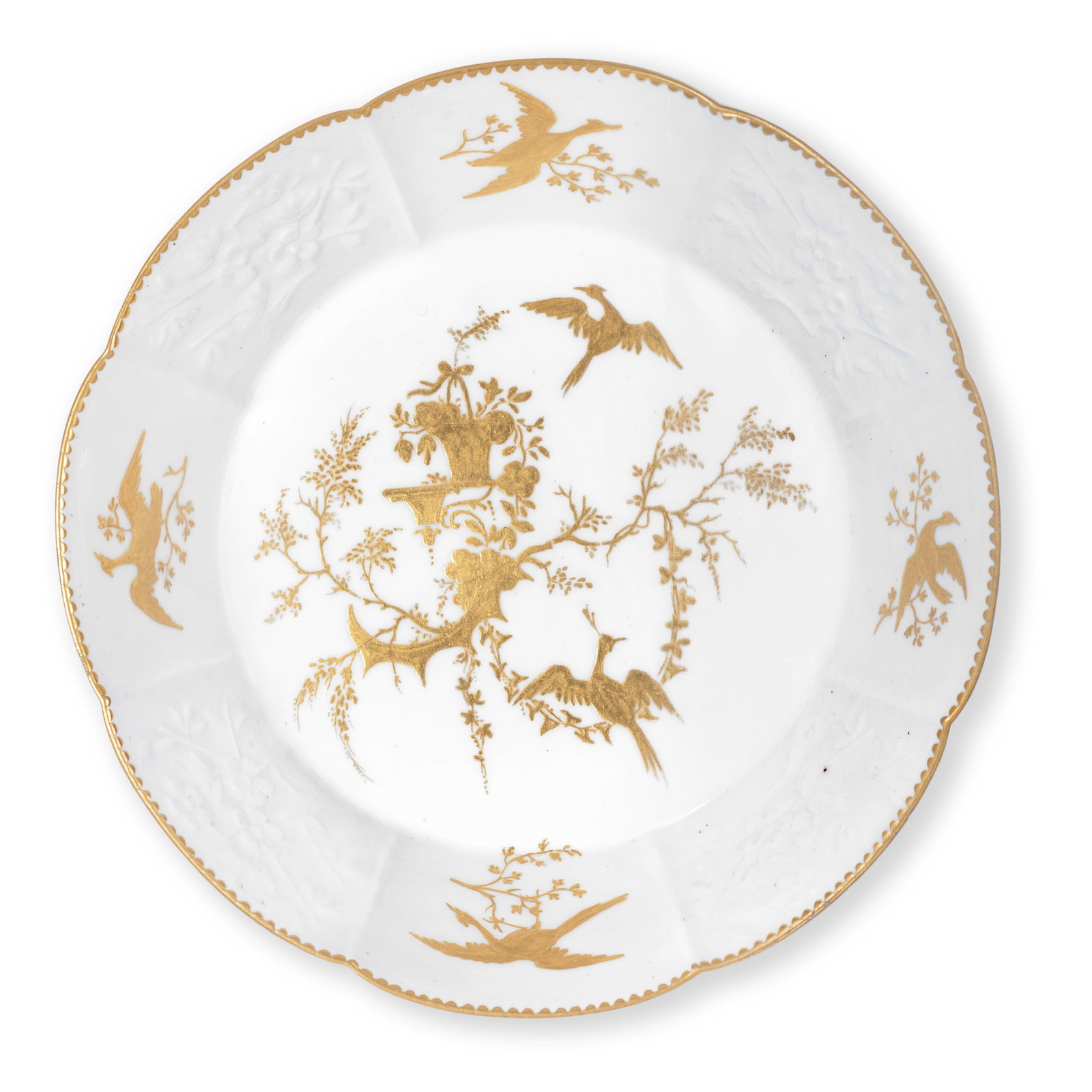A very rare and large Vincennes saucer (soucoupe de gobelet à lait à côtes à...: A very rare and large Vincennes saucer (soucoupe de gobelet à lait à côtes à relief), circa 1753 Of lobed octafoil form, moulded with panels of flowering prunus branches alternatin