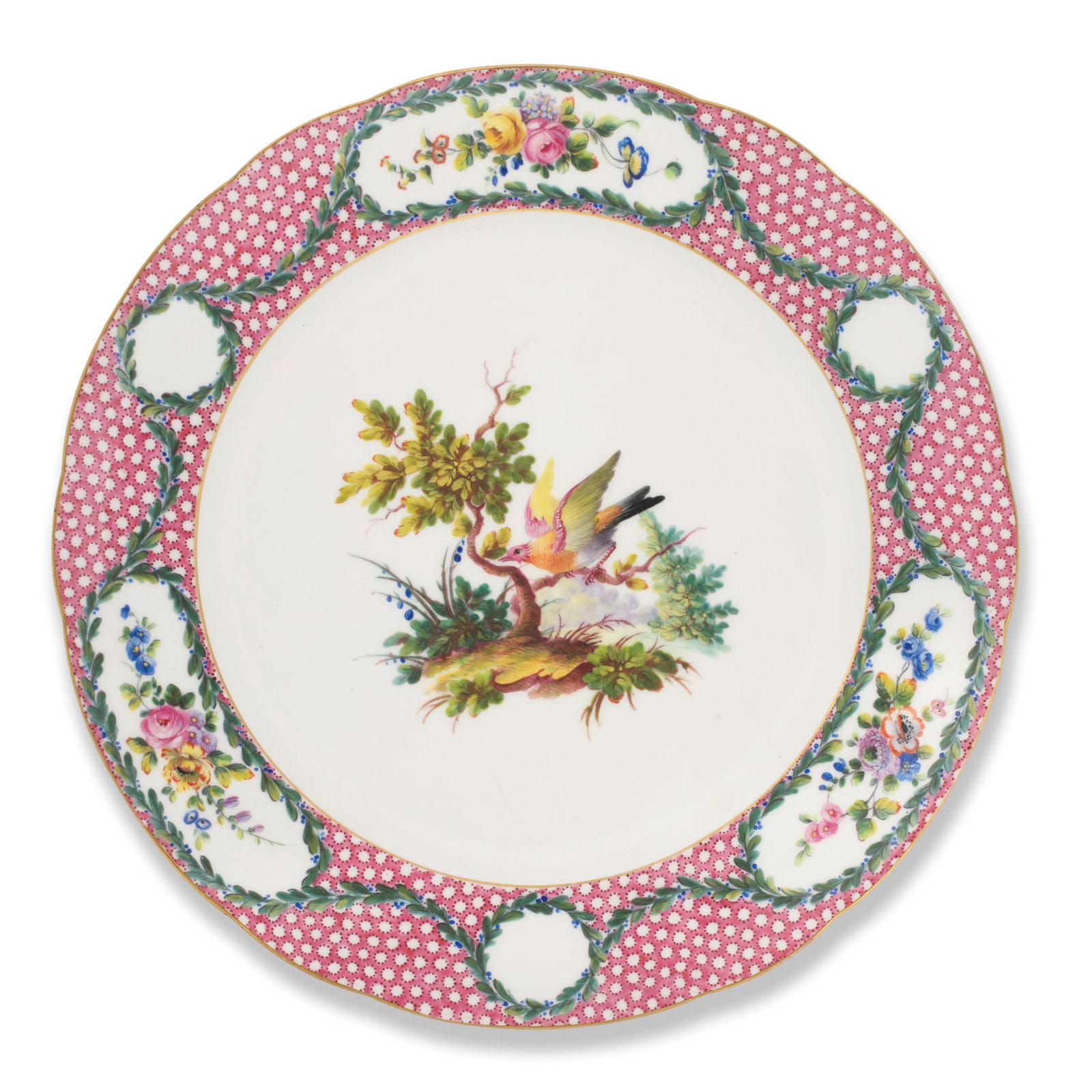 A Sèvres plate, circa 1770: A Sèvres plate, circa 1770 The centre with a bird perched on a branch in a landscape vignette, the gilt-edged rim with a crimson fond Taillandier reserved with three flower panels alternating wit