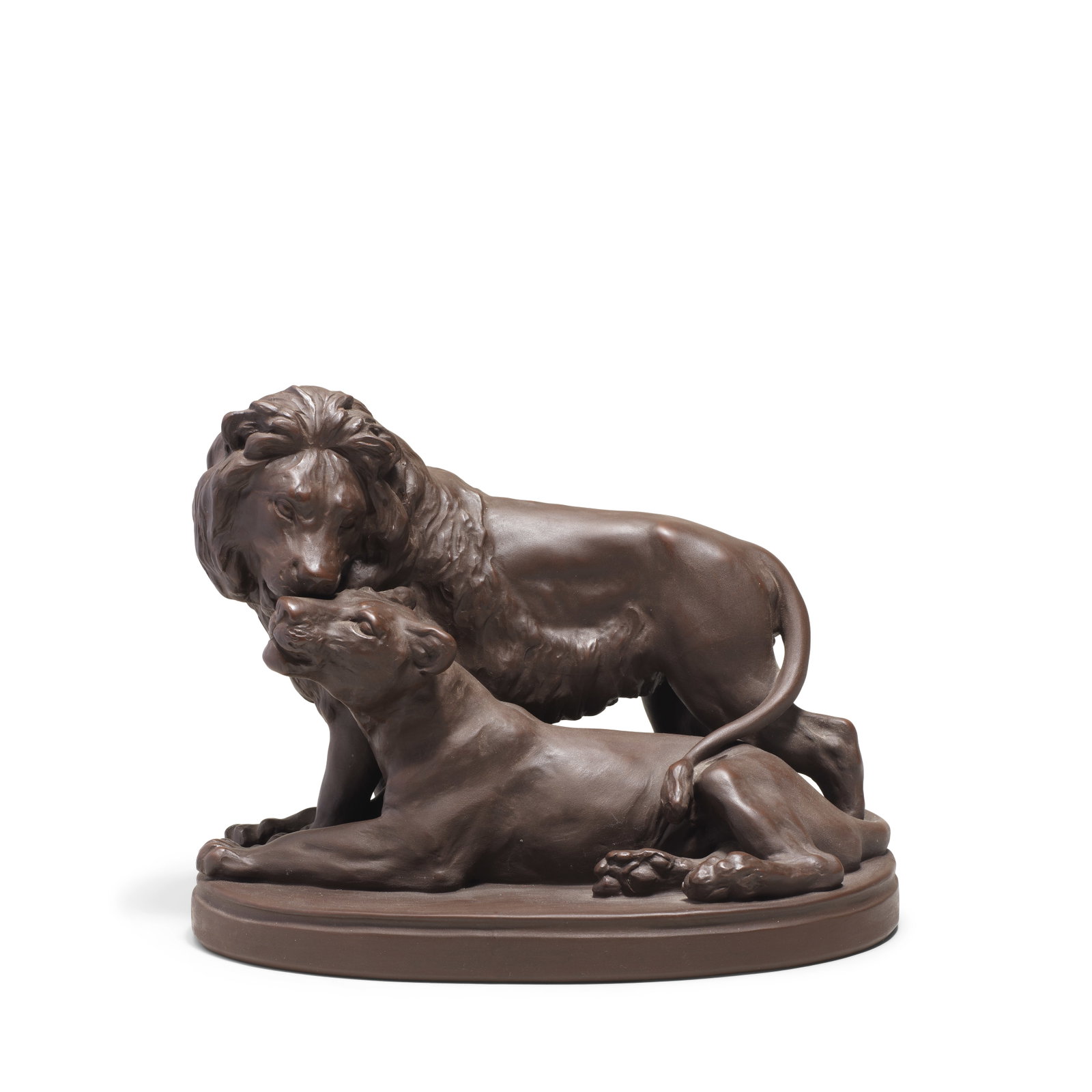 A Meissen Böttger stoneware group of lions, dated 1983: A Meissen Böttger stoneware group of lions, dated 1983 Modelled by Erich Hösel with a male lion grooming a reclining lioness, on an oval base, 17.2cm high, 22.4cm across, impressed crossed s