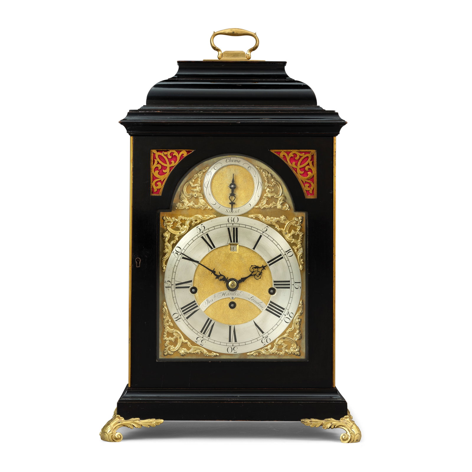 A late 18th century ebonised quarter chiming table clock Joseph Harding, London: A late 18th century ebonised quarter chiming table clock Joseph Harding, London The case sumounted by a brass carrying handle over an inverted bell top with moulded cornice, the front with later brass