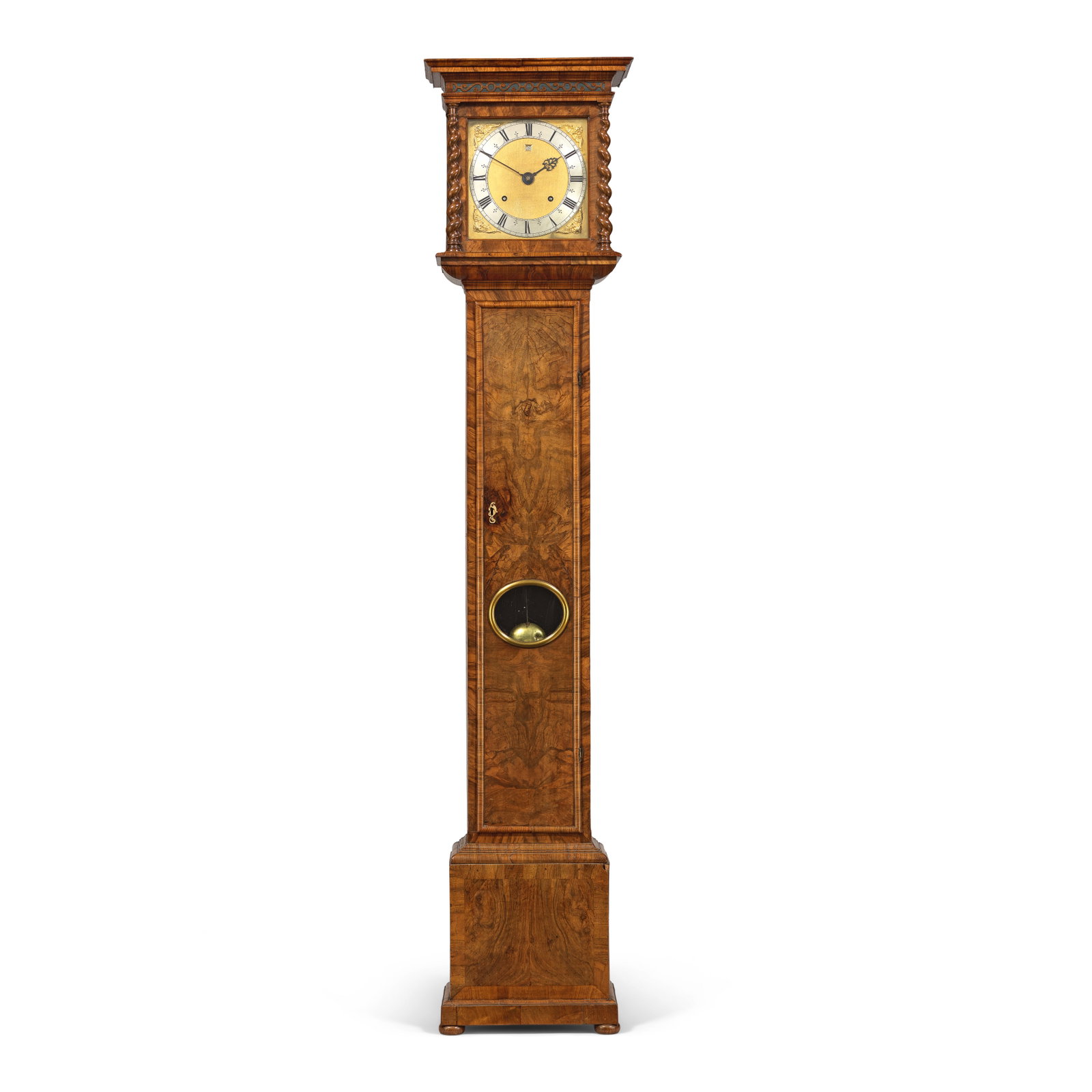 A late 17th century walnut veneered month-going longcase clock with rare cariniana wood carcass ...: A late 17th century walnut veneered month-going longcase clock with rare cariniana wood carcass Joseph Knibb, London The rising hood with flat top over a moulded cornice and pierced silk-backed sound 