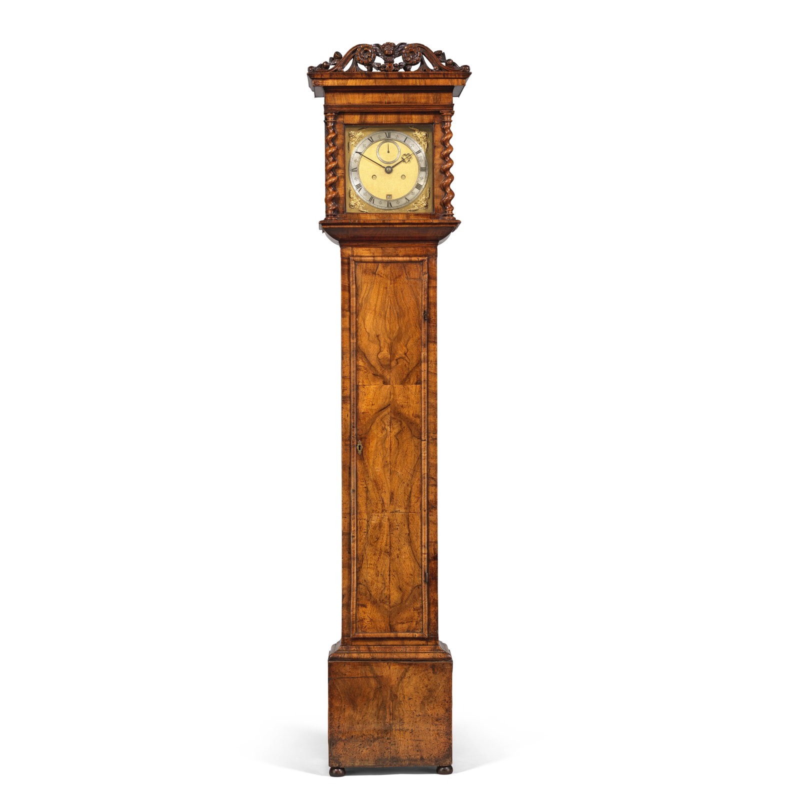 A fine and rare late 17th century eight-day walnut longcase clock Thomas Tompion, London, pre-nu...: A fine and rare late 17th century eight-day walnut longcase clock Thomas Tompion, London, pre-numbered, circa 1680 The case surmounted by a carved cresting to a flat-fronted overhanging cornice raised