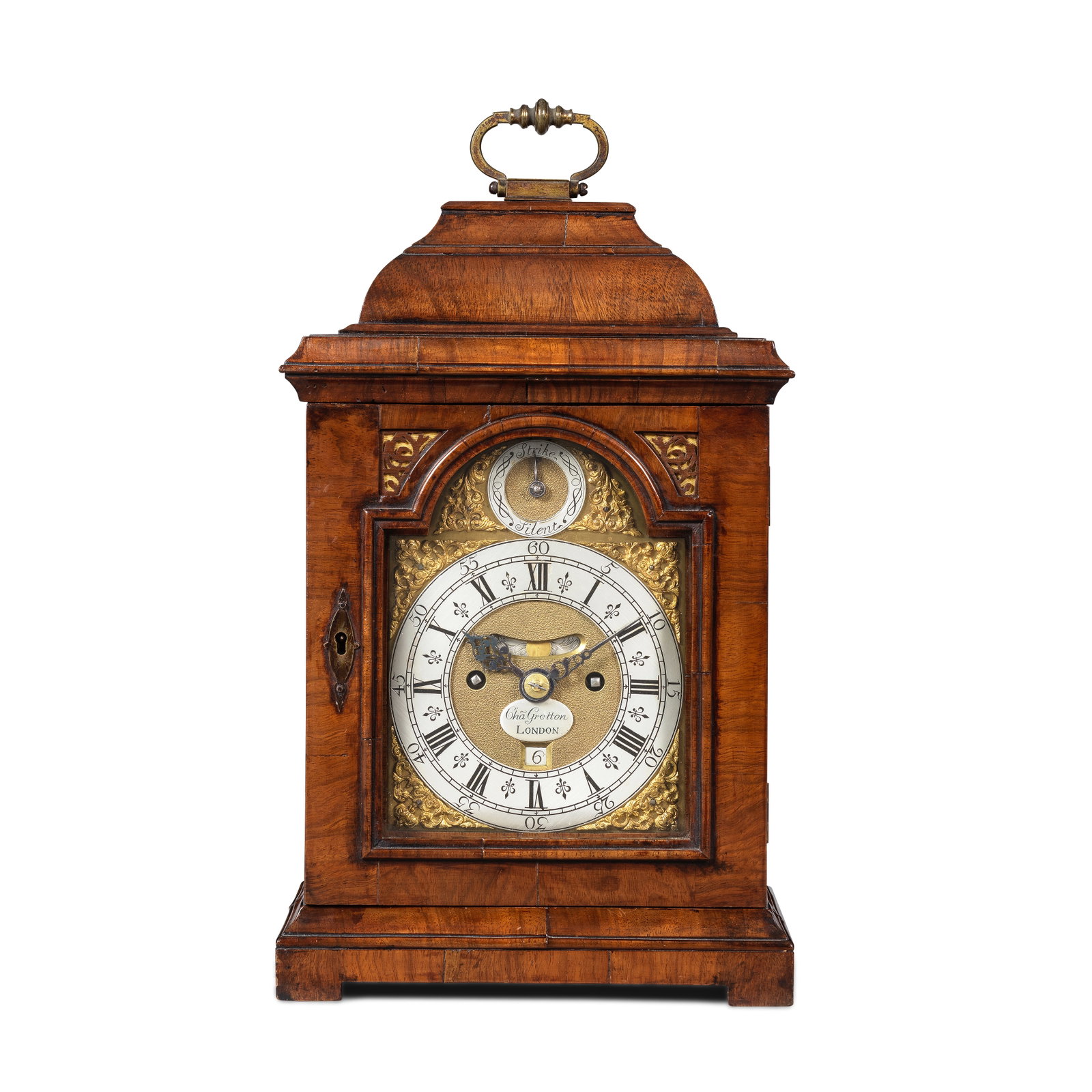 A small walnut cased quarter repeating table clock Signed on an applied nameplate Charles Gret... (1 of 1)