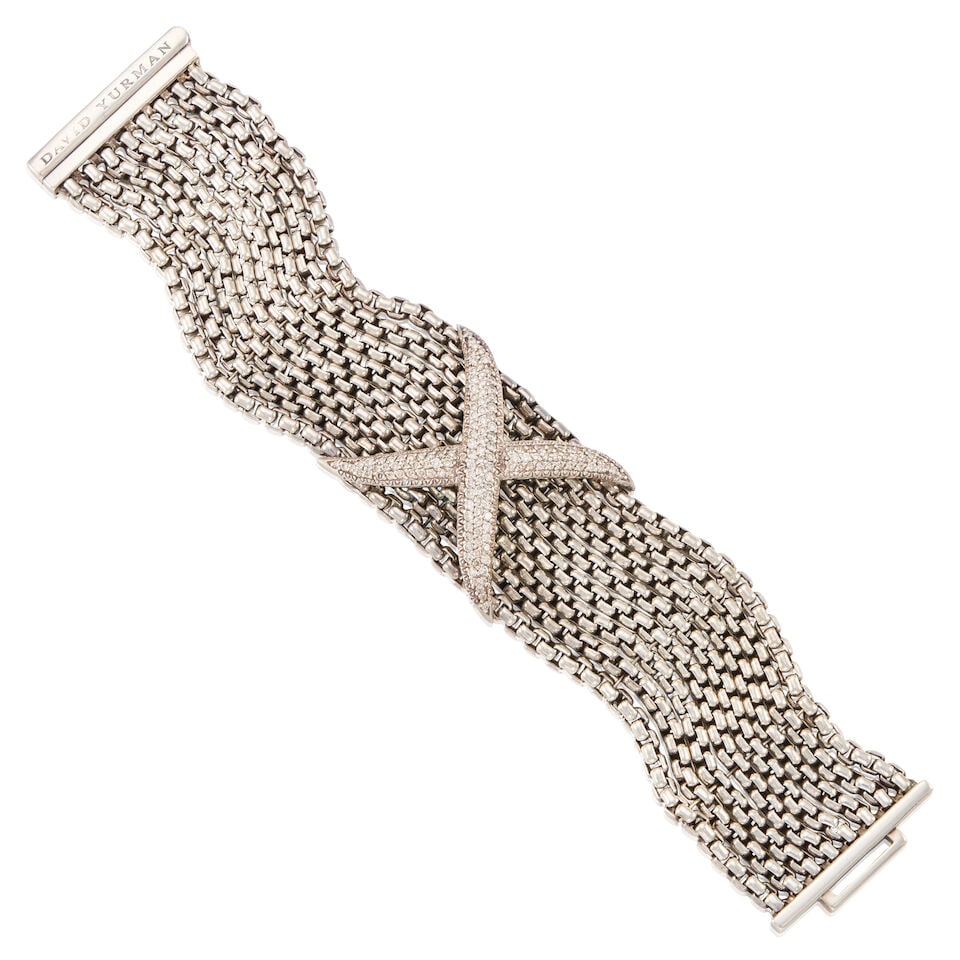 DAVID YURMAN: A DIAMOND AND STERLING SILVER BRACELET: DAVID YURMAN: A DIAMOND AND STERLING SILVER BRACELET • Numerous round shaped diamonds weighing approximately 1.35 carats total • Stamped DAVID YURMAN • Length 6 3/4 in. •