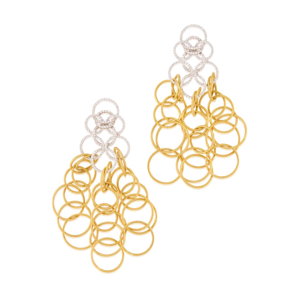 A PAIR OF 18K BICOLORED GOLD AND DIAMOND EARRINGS: A PAIR OF 18K BICOLORED GOLD AND DIAMOND EARRINGS • Numerous round shaped diamonds • Measures 2 1/2 in. x 1 1/4 in. • Estimated gross weight: 21.0 grams Footnotes: OVERALL