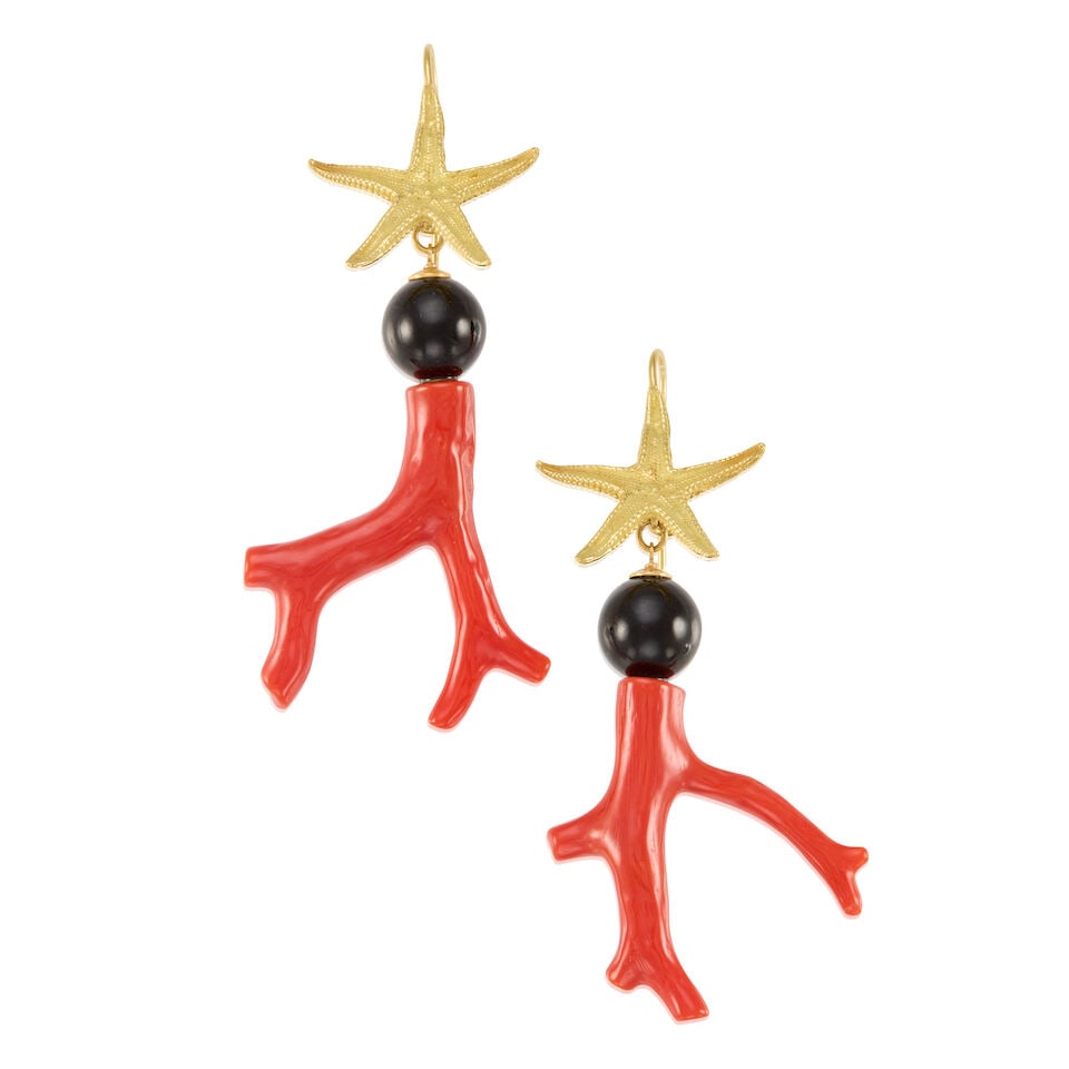 A PAIR OF 19K YELLOW GOLD, CORAL, AND ONYX EARRINGS: A PAIR OF 19K YELLOW GOLD, CORAL, AND ONYX EARRINGS • Two round and drilled onyx beads measuring approximately 12.08mm in diameter • Two carved coral pieces measuring approximately
