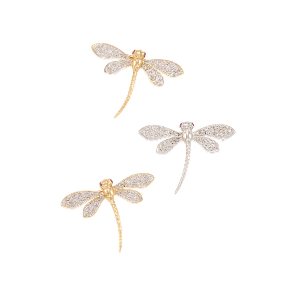 THREE 14K GOLD AND DIAMOND DRAGONFLY BROOCHES: THREE 14K GOLD AND DIAMOND DRAGONFLY BROOCHES • One 14K yellow gold brooch with two round shaped rubies weighing approximately 0.02 carat total, with numerous round shaped diamonds weighing