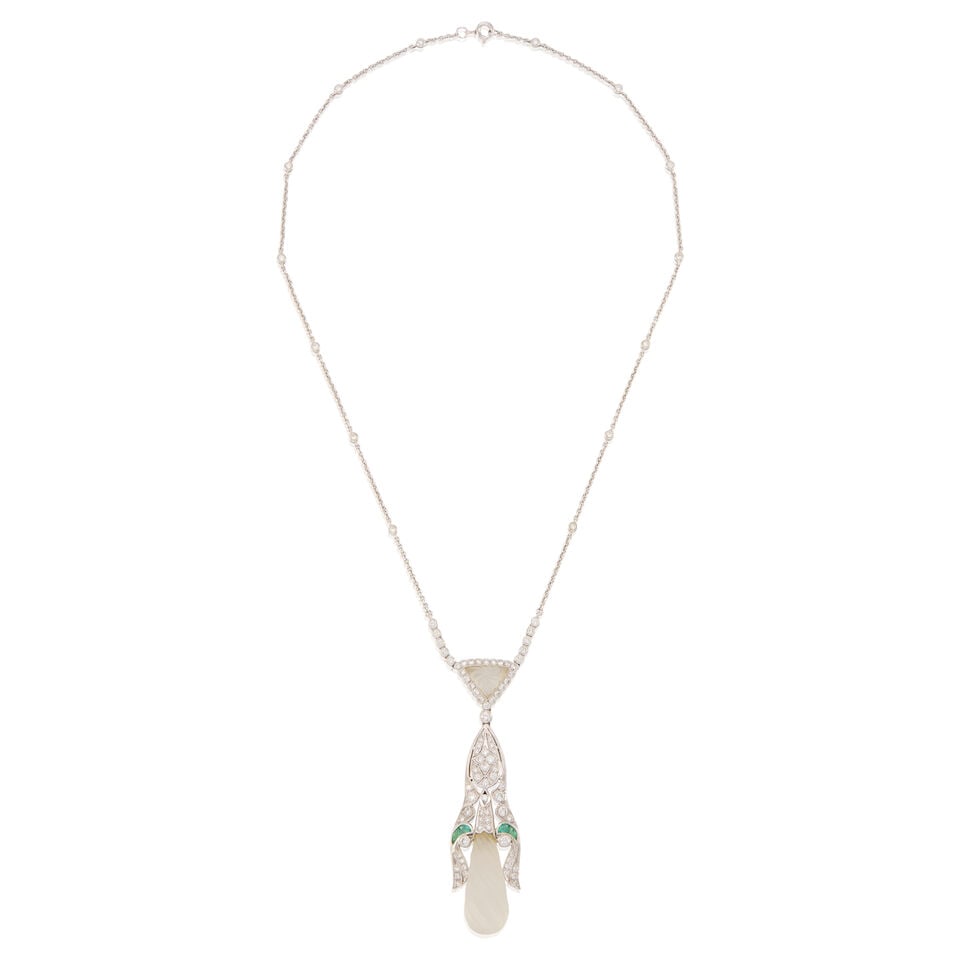 AN 18K WHITE GOLD, ROCK CRYSTAL, EMERALD, AND DIAMOND NECKLACE: AN 18K WHITE GOLD, ROCK CRYSTAL, EMERALD, AND DIAMOND NECKLACE • Two carved rock crystal pieces, measuring 11.60mm x 8.38mm x 3.94mm and 25.25mm x 10.81mm x 10.95mm • Numerous round