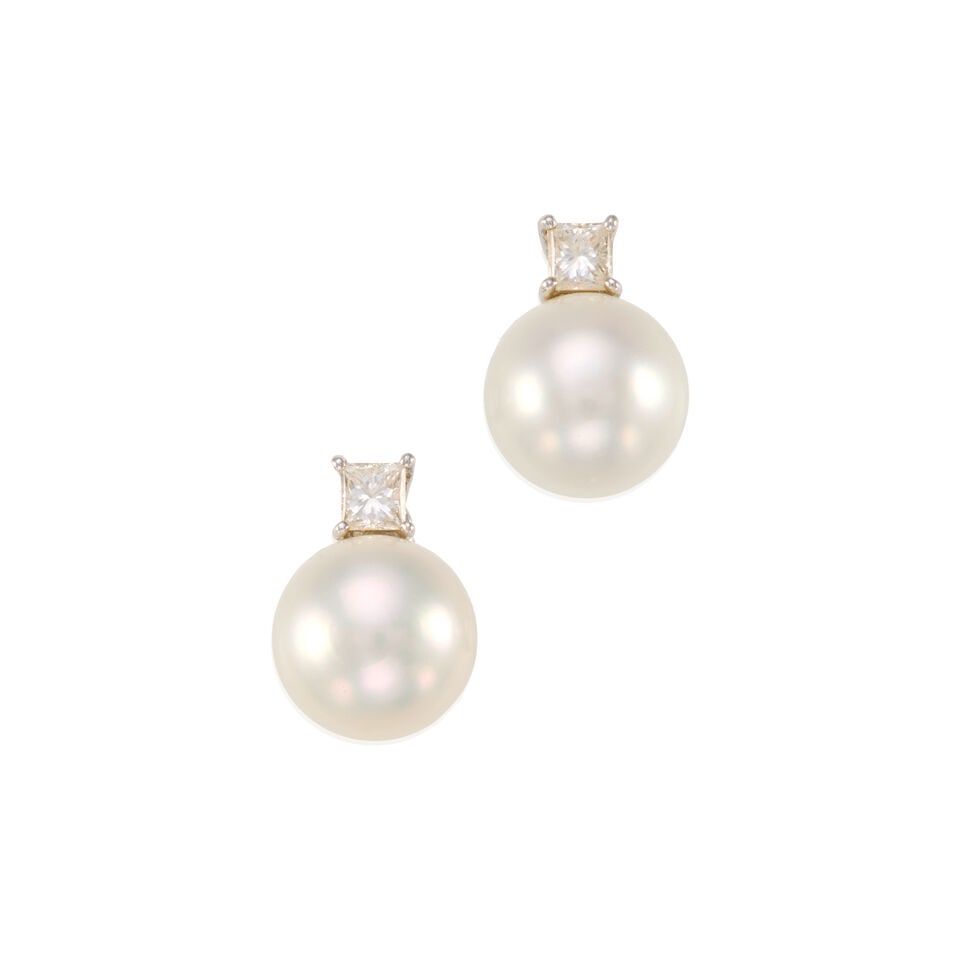 A PAIR OF 17K WHITE GOLD, PLATINUM, CULTURED PEARL, AND DIAMOND EARRINGS: A PAIR OF 17K WHITE GOLD, PLATINUM, CULTURED PEARL, AND DIAMOND EARRINGS • Two cultured pearls measuring approximately 12.25mm in diameter • Two square shaped diamonds weighing