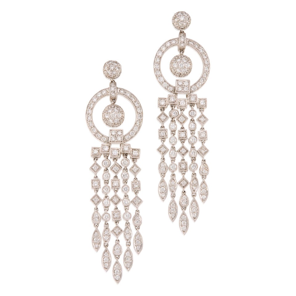 A PAIR OF 18K WHITE GOLD AND DIAMOND EARRINGS: A PAIR OF 18K WHITE GOLD AND DIAMOND EARRINGS • Numerous round shaped diamonds weighing approximately 1.90 carats total • Measures 2 3/4 in. x 3/4 in. • Estimated gross weight: 25.0