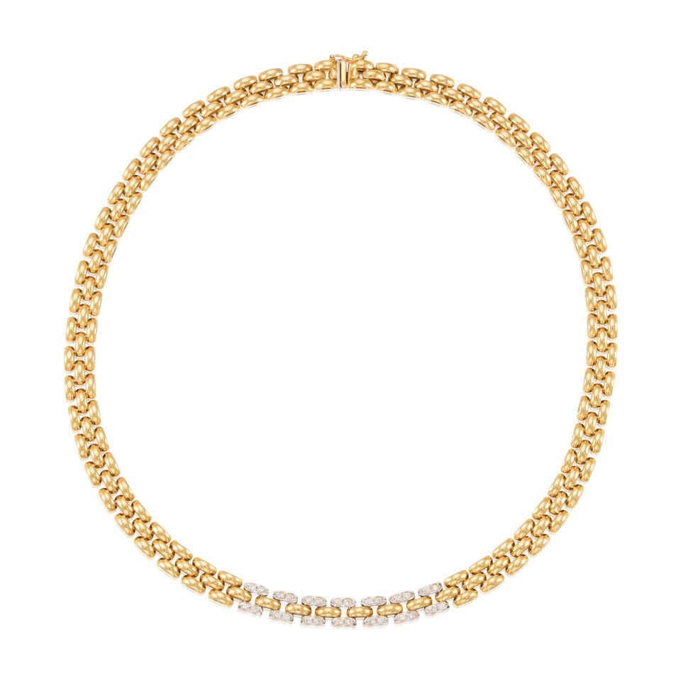 A 18K BICOLORED GOLD AND DIAMOND NECKLACE: A 18K BICOLORED GOLD AND DIAMOND NECKLACE • Numerous round shaped diamonds weighing approximately 0.28 carat total • Length 15 3/4 in. • Estimated gross weight: 30.0