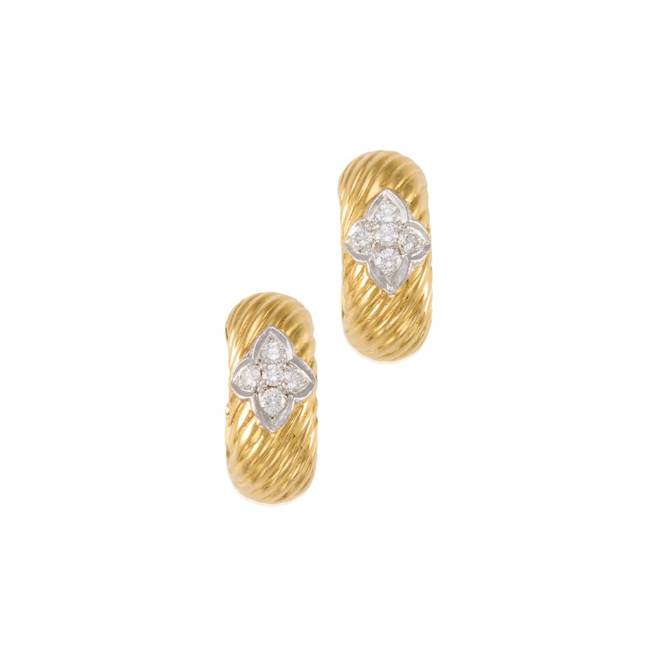 A PAIR OF 18K YELLOW GOLD AND DIAMOND EARRINGS: A PAIR OF 18K YELLOW GOLD AND DIAMOND EARRINGS • Ten round shaped diamonds weighing approximately 0.20 carat total • Measures 3/4 in. x 5/16 in. • Estimated gross weight: 8.8